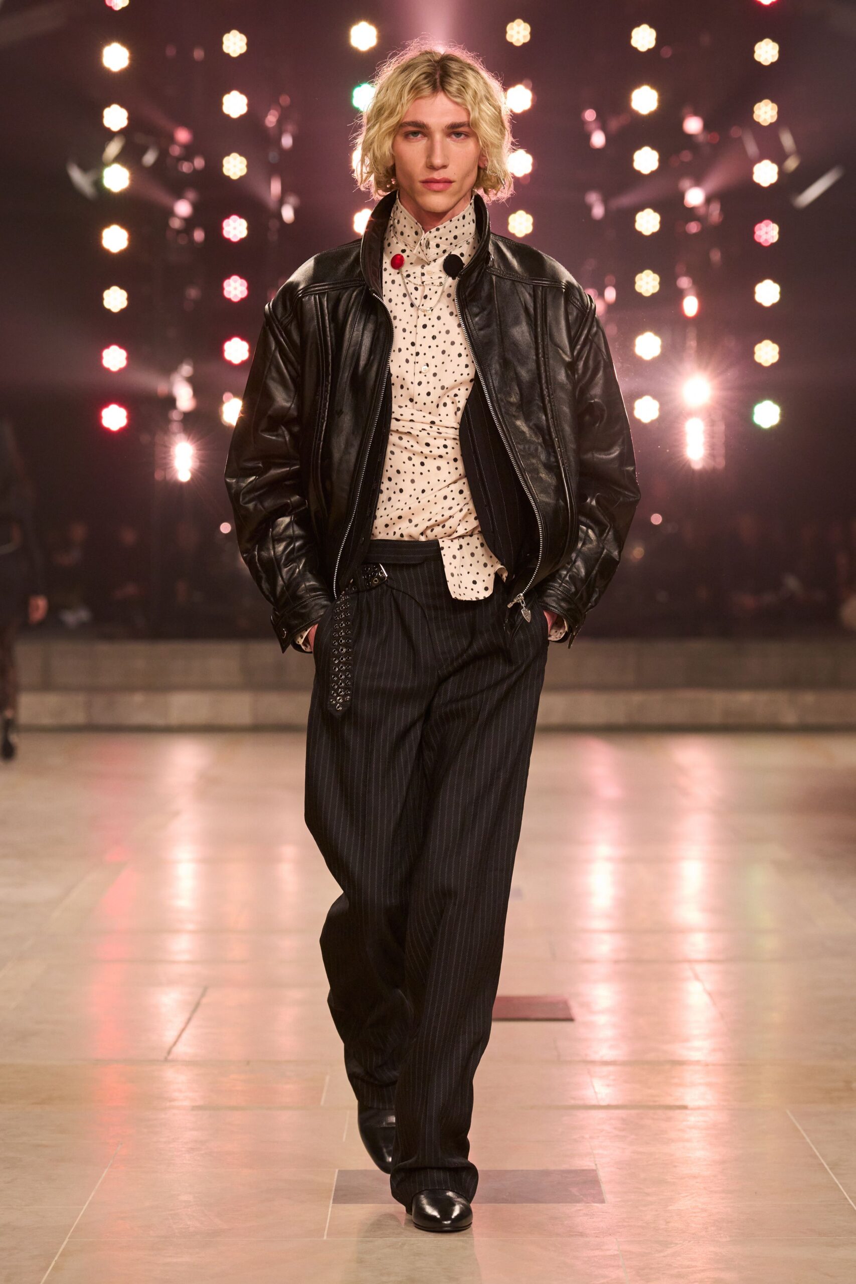 black leather jacket with polka-dot shirt