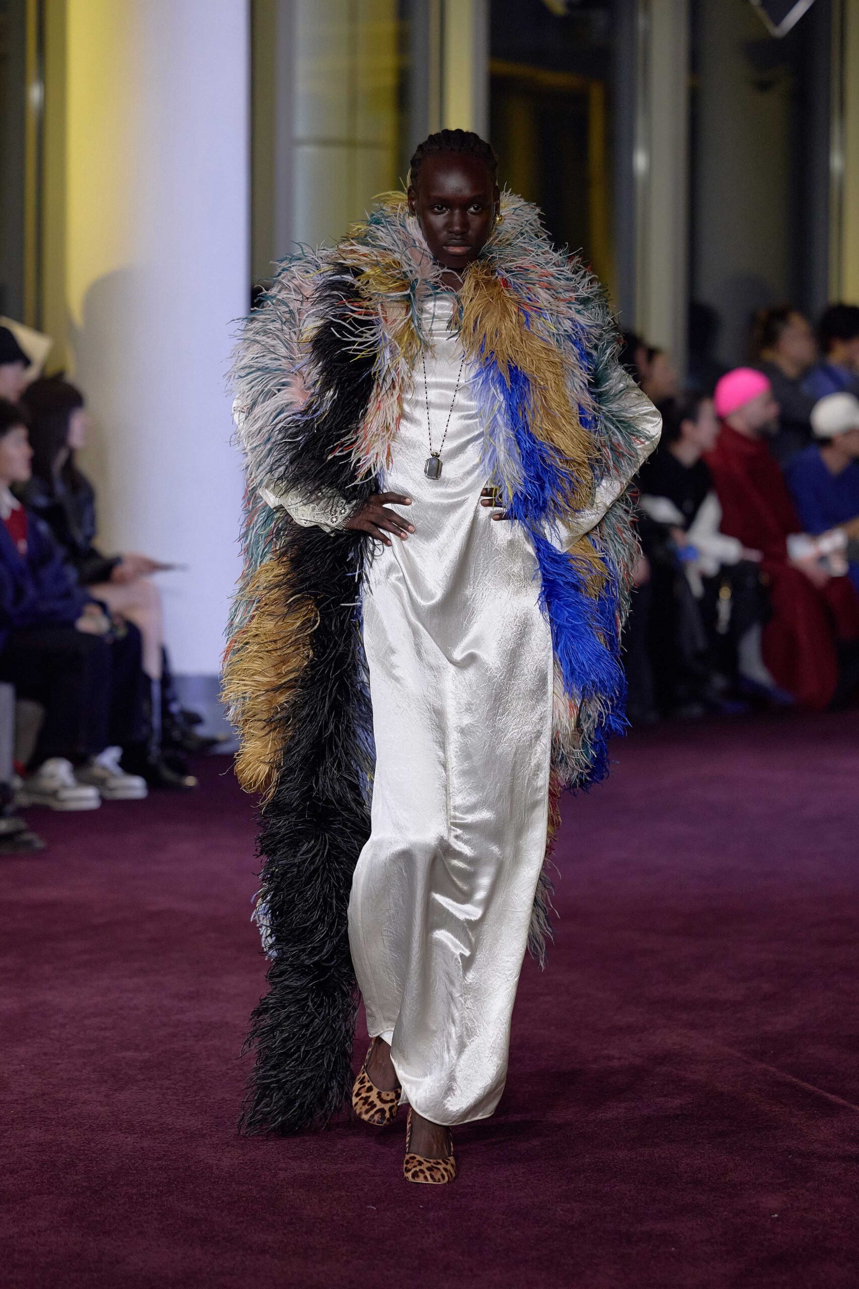 white silk fitted gown with fringed coat