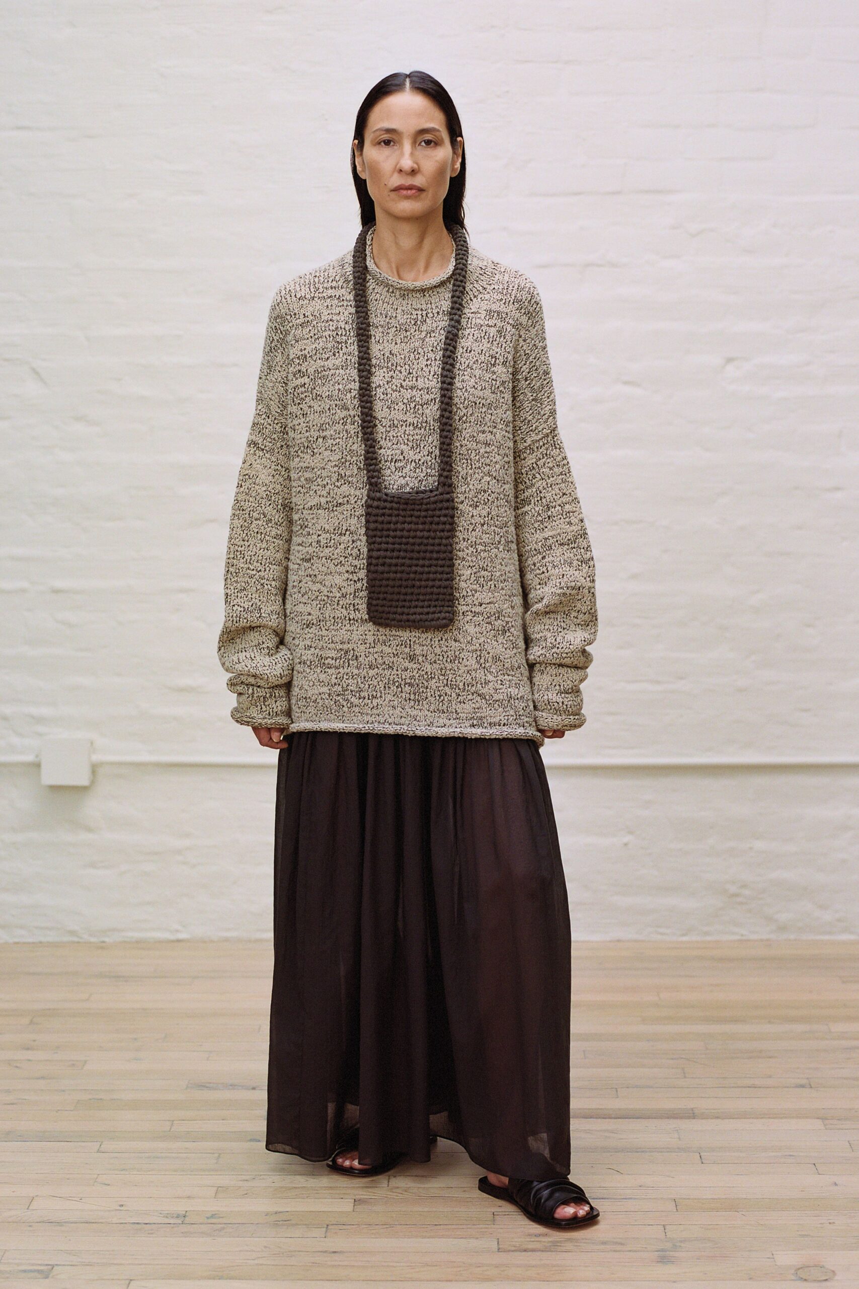 beige oversized sweater black layered skirt