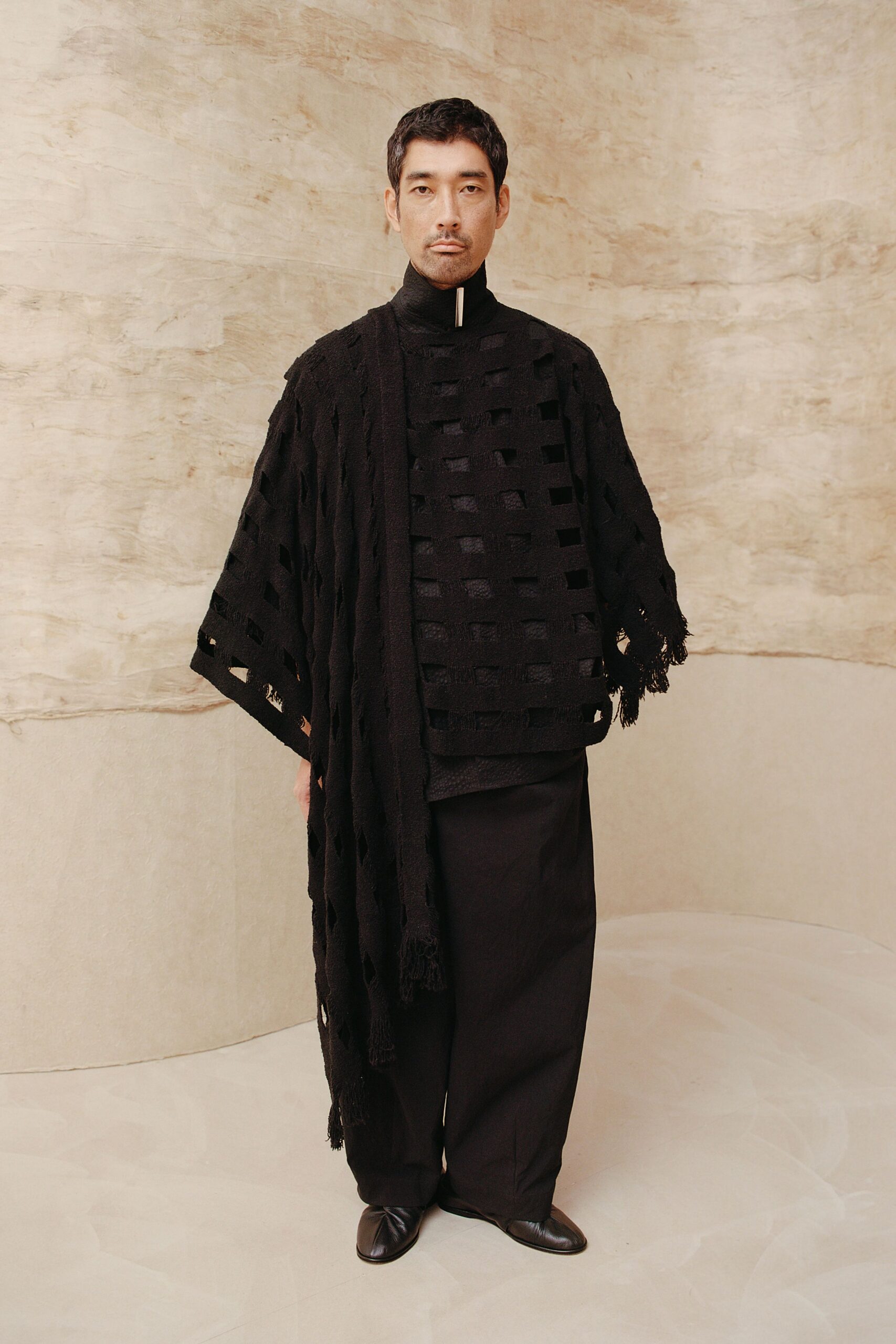 black cotton long-sleeve collared relaxed fringed cape