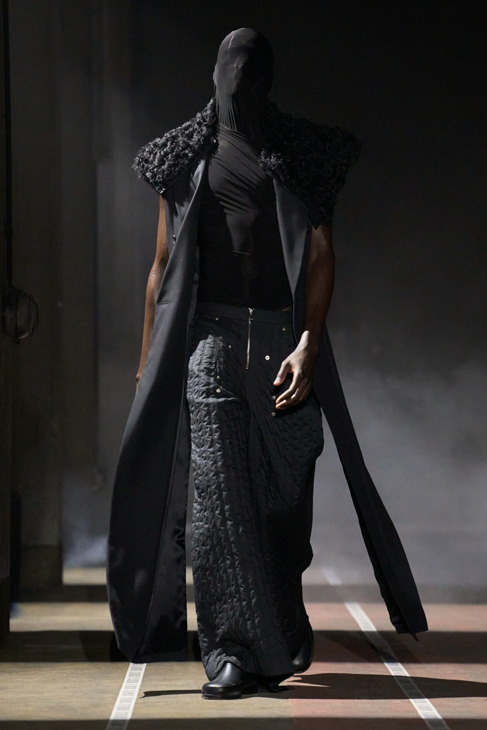 black coat with fitted top and pants