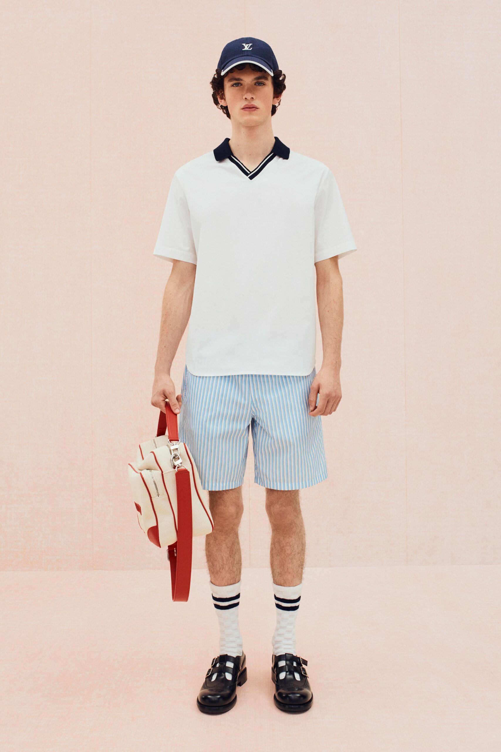white relaxed shirt with blue striped shorts