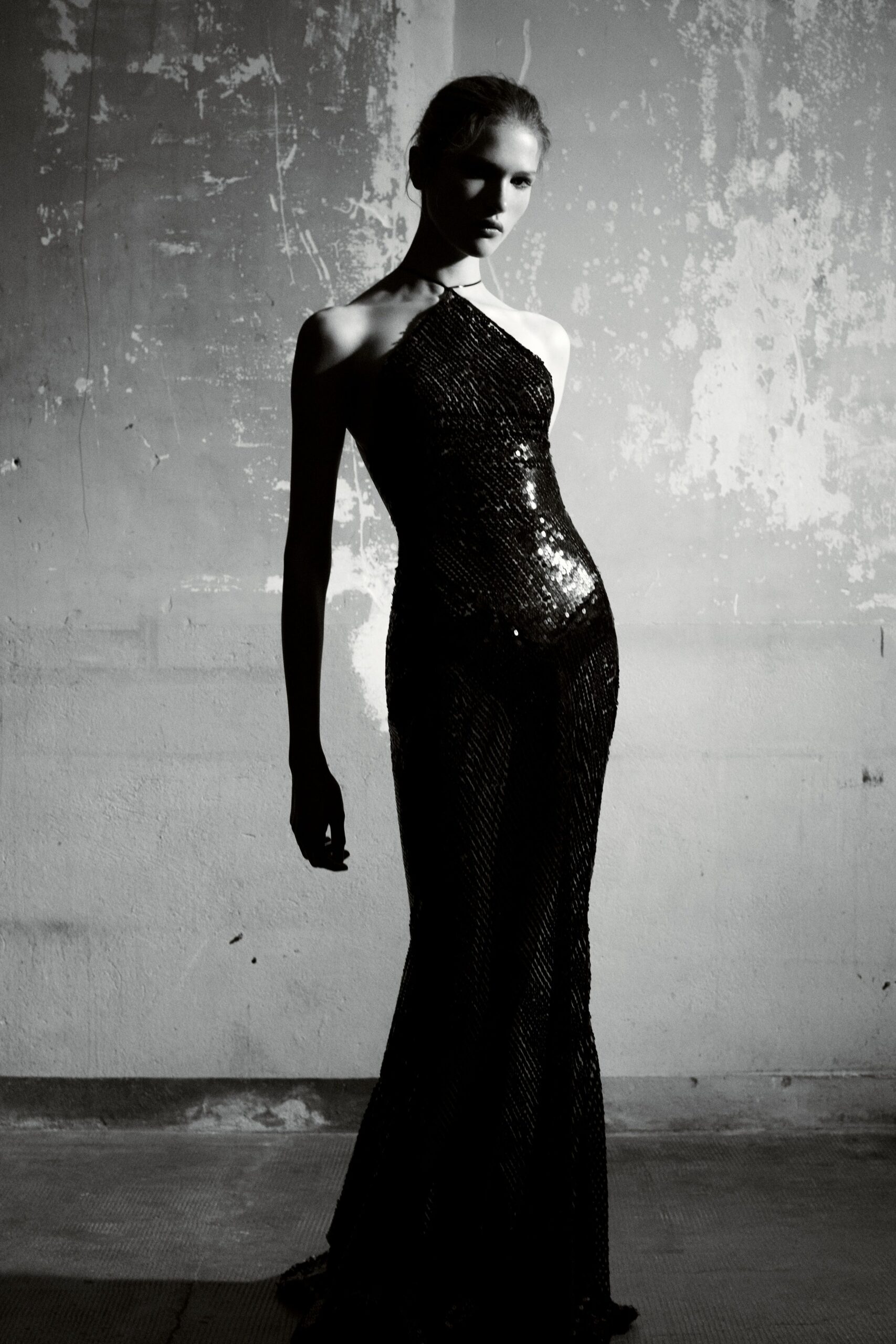 black sequin sleeveless gown