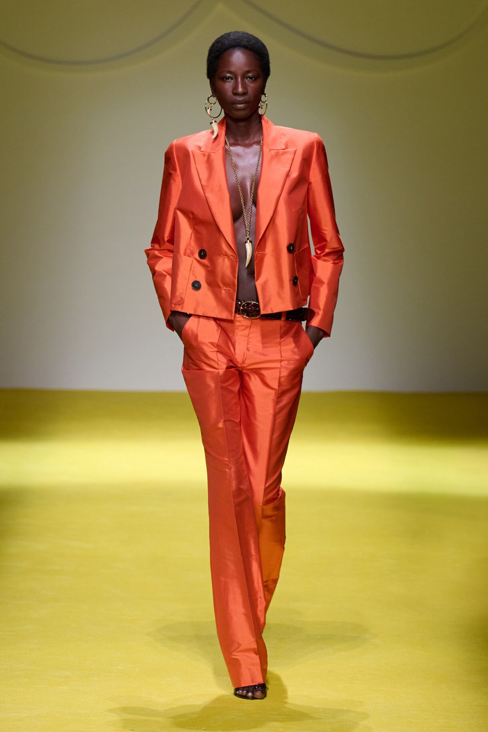 orange tailored blazer and pants