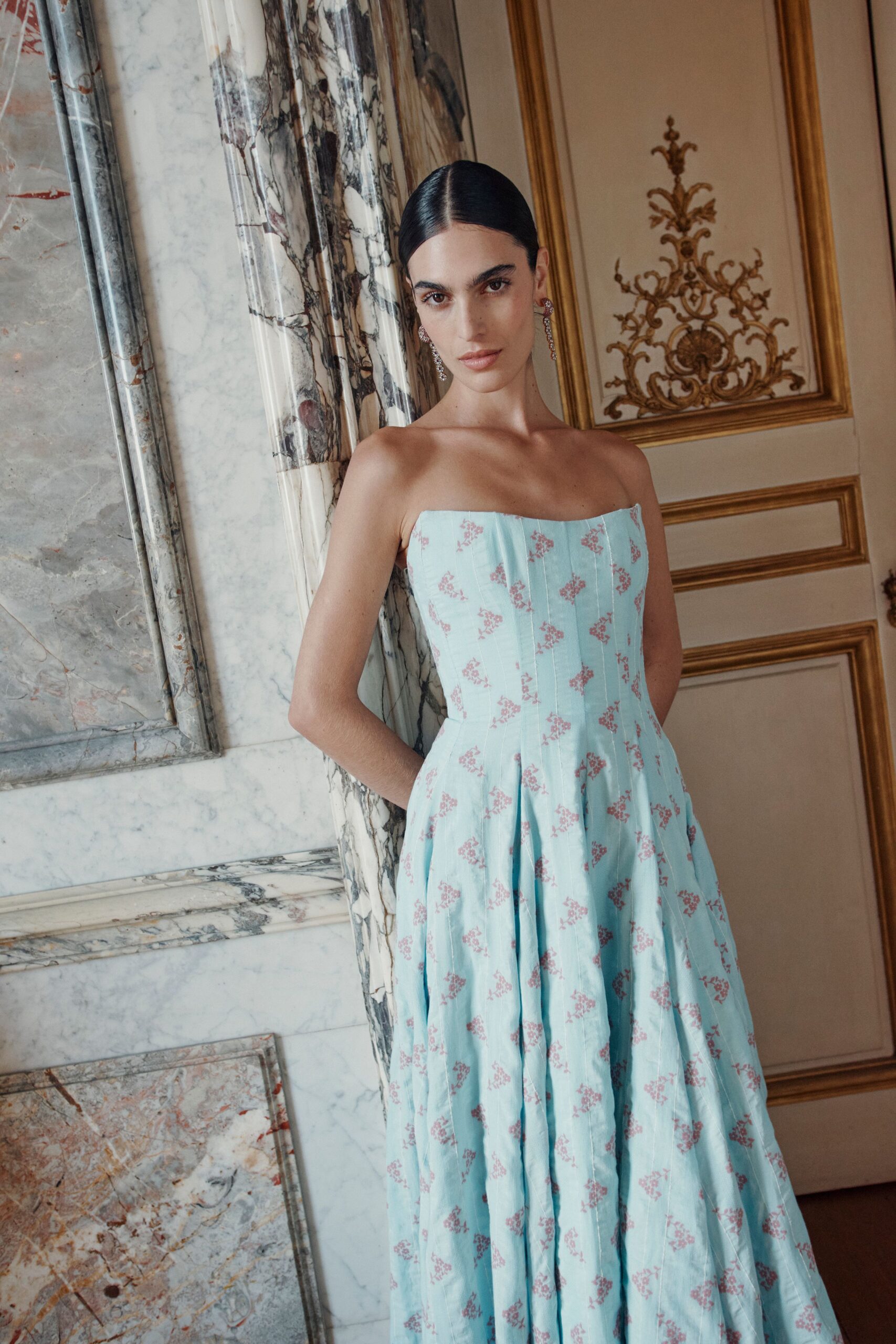 blue embroidered strapless gown