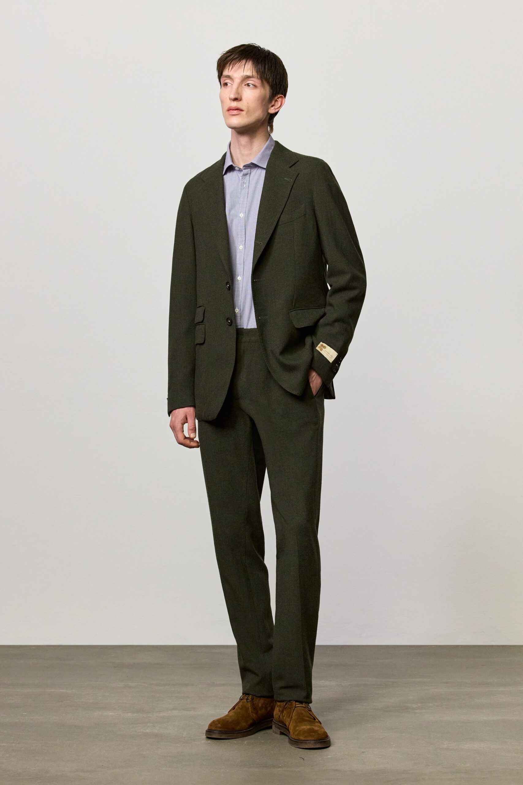 green wool long-sleeve collared tailored buttoned suit