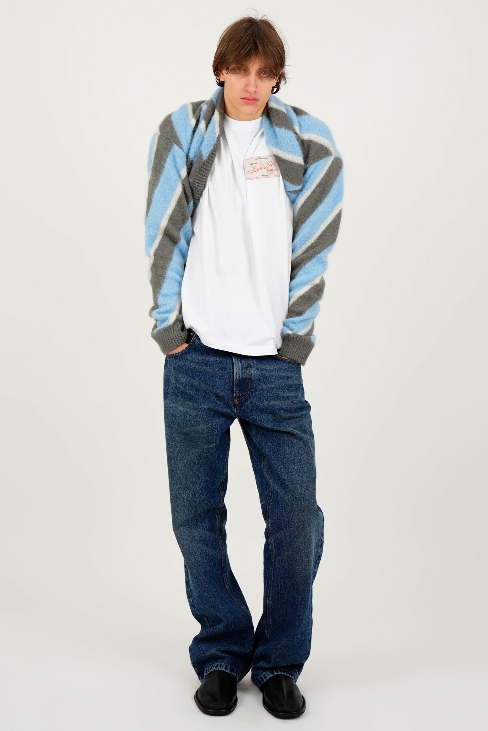 oversized gray striped sweater with t-shirt and jeans