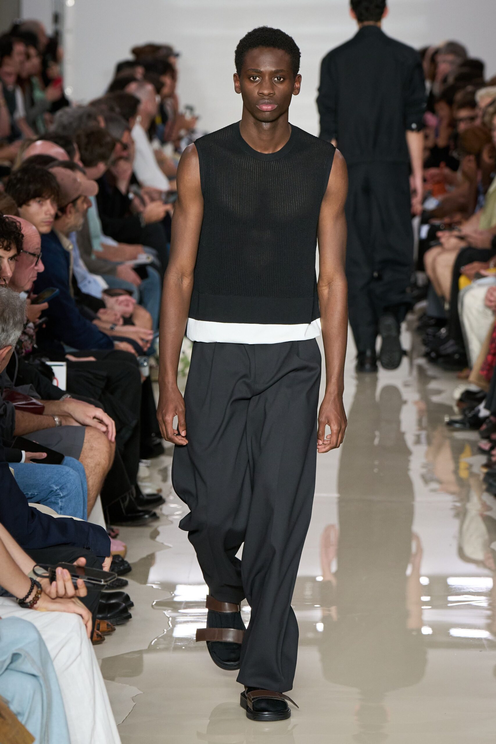 black fitted top and relaxed pants