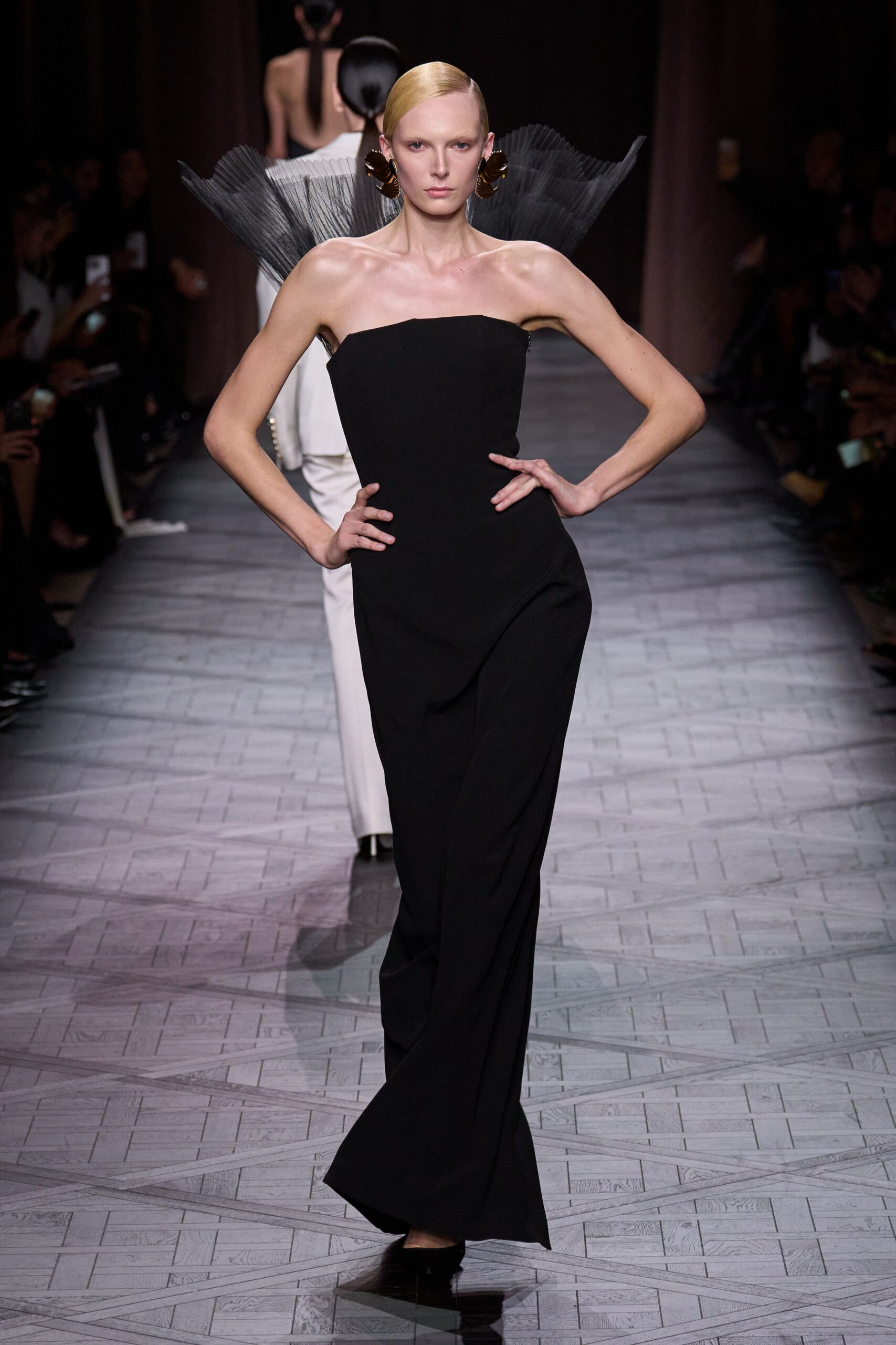 black strapless draped gown