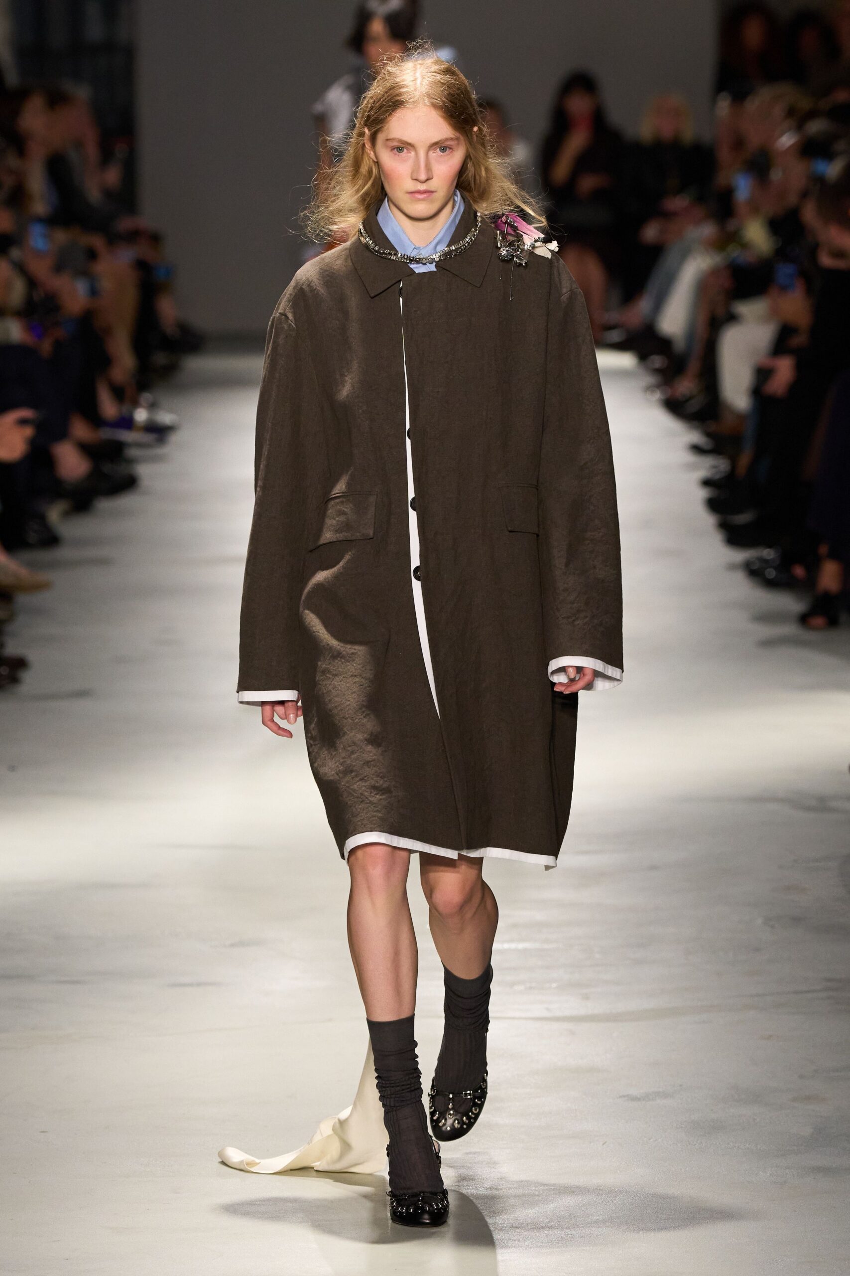 brown relaxed coat with white dress