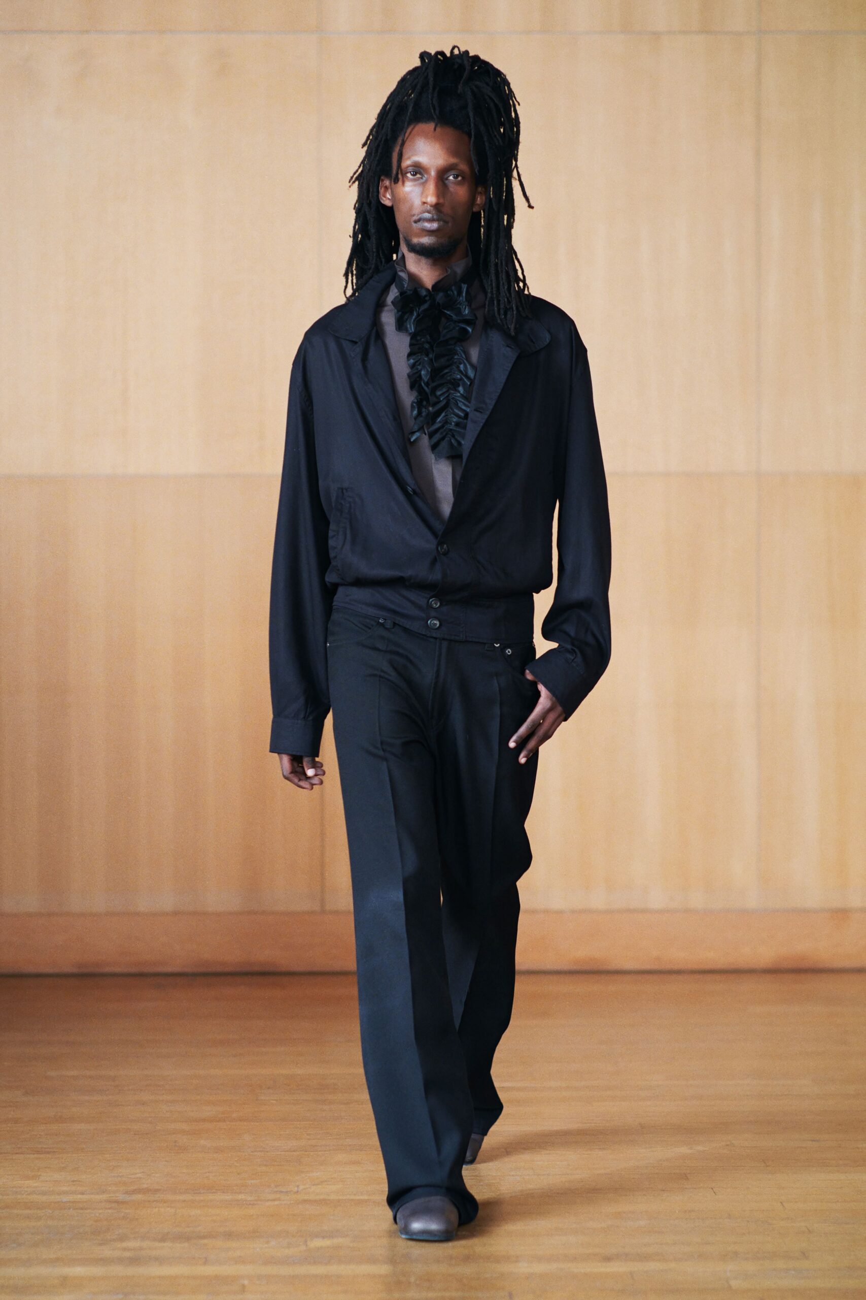 black relaxed shirt and fitted pants