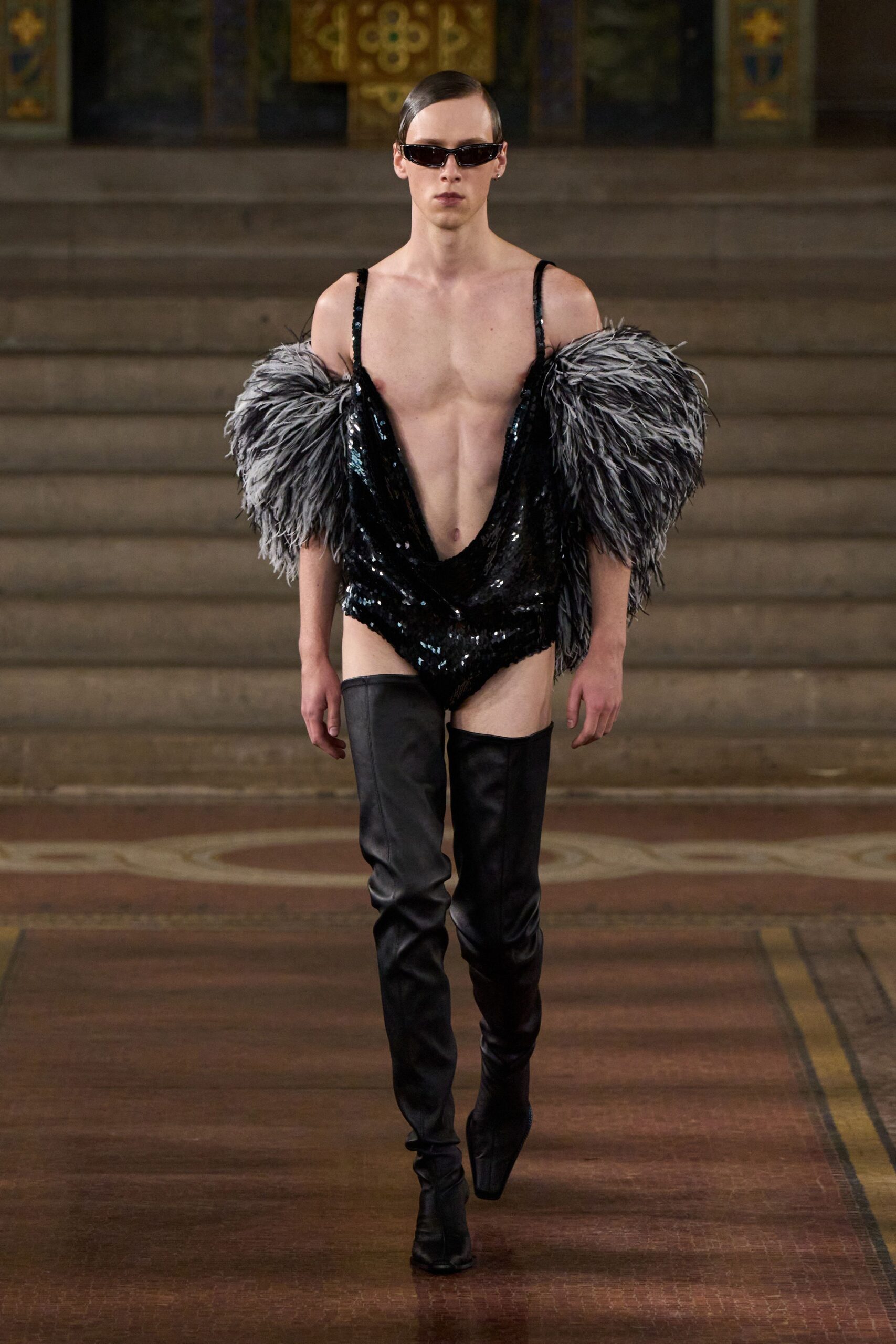 black sequin bodysuit with fur cape
