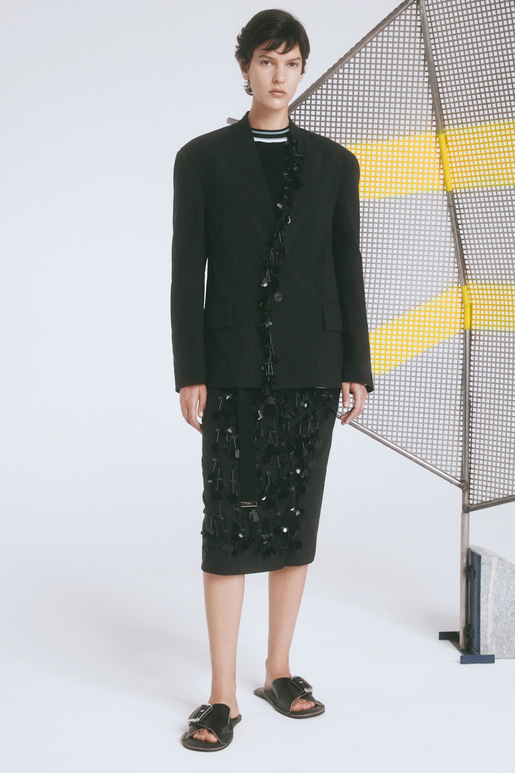 black wool long-sleeve collared structured buttoned draped blazer