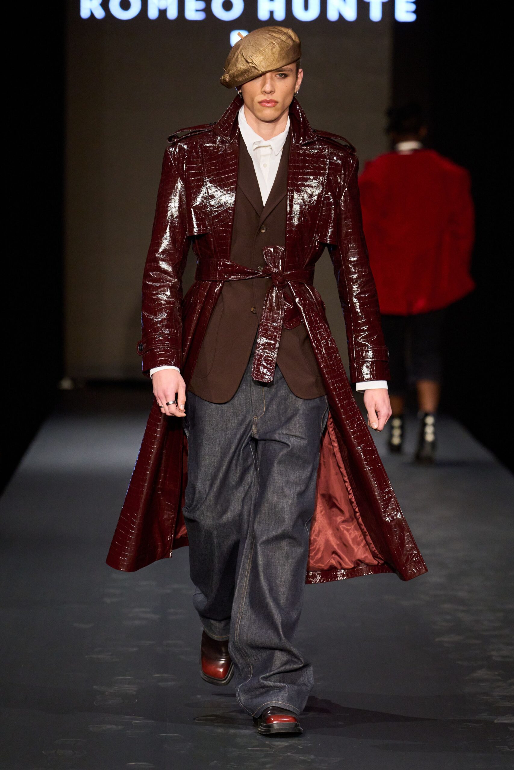red vinyl long-sleeve collared fitted belted shiny trench