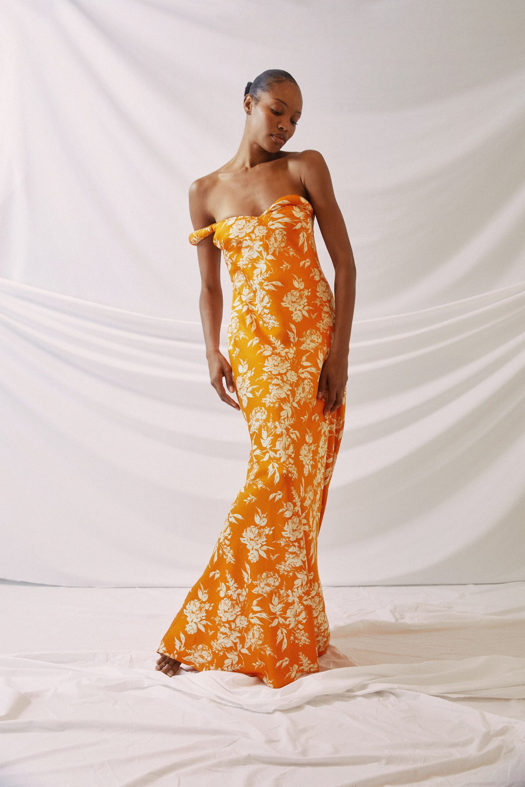 orange floral strapless gown