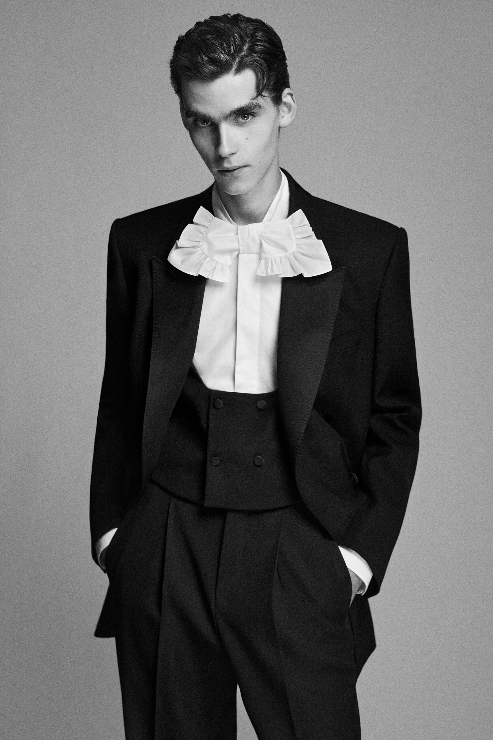 black wool long-sleeve collared tailored buttoned suit