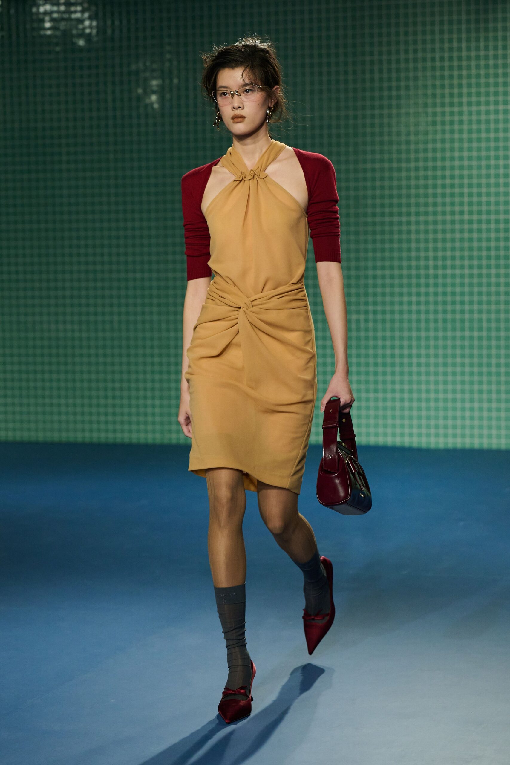 fitted yellow mini dress with red jacket