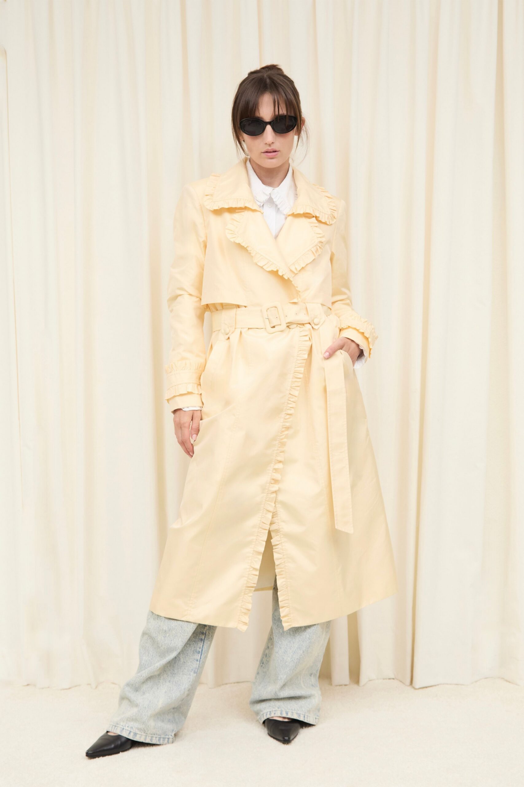 yellow cotton long-sleeve collared fitted belted ruffled trench