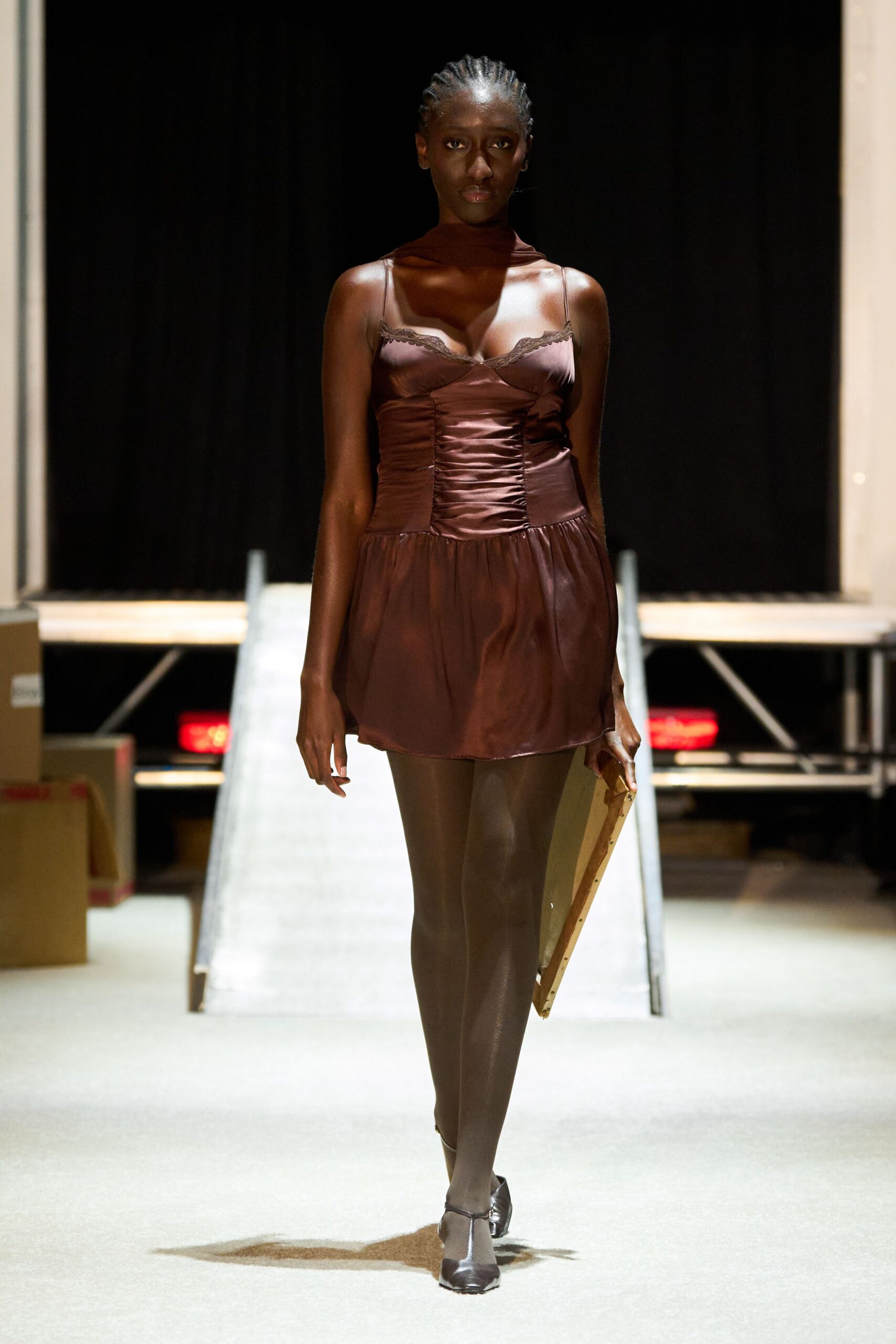 brown silk mini-dress with black shoes