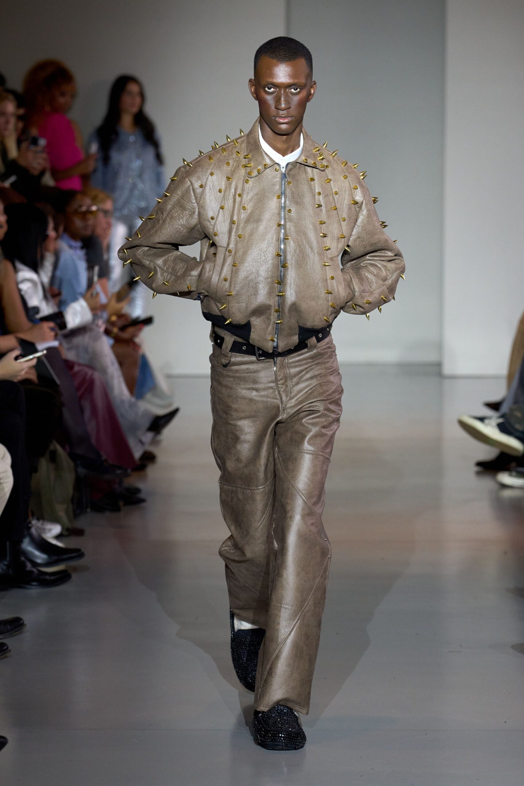 brown leather spiked jacket and pants