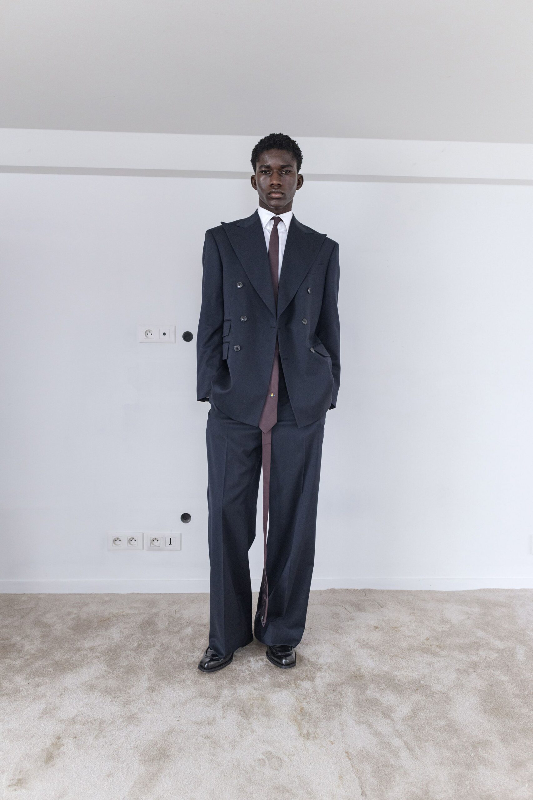 black tailored suit with white shirt