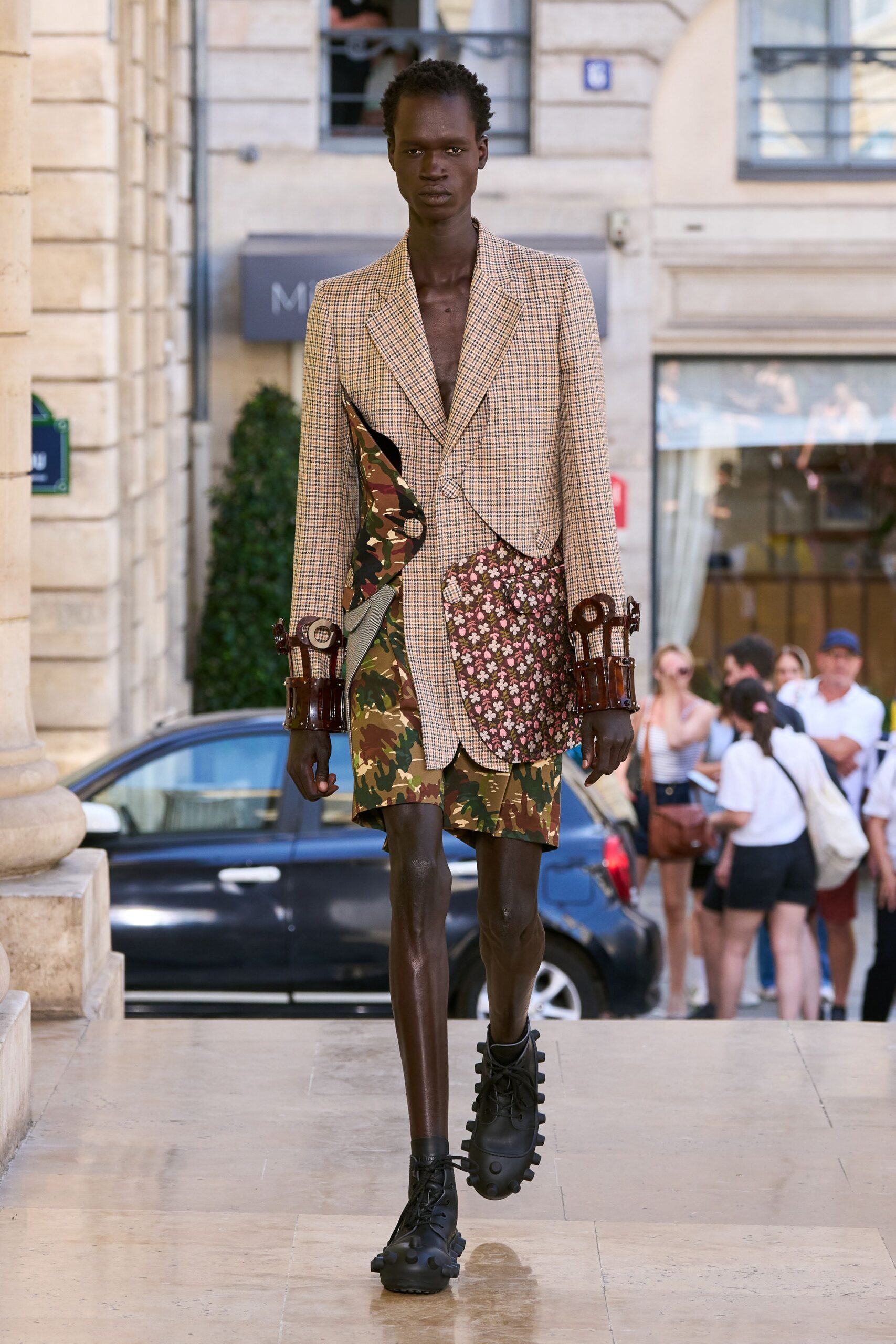 beige tailored blazer with cargo shorts