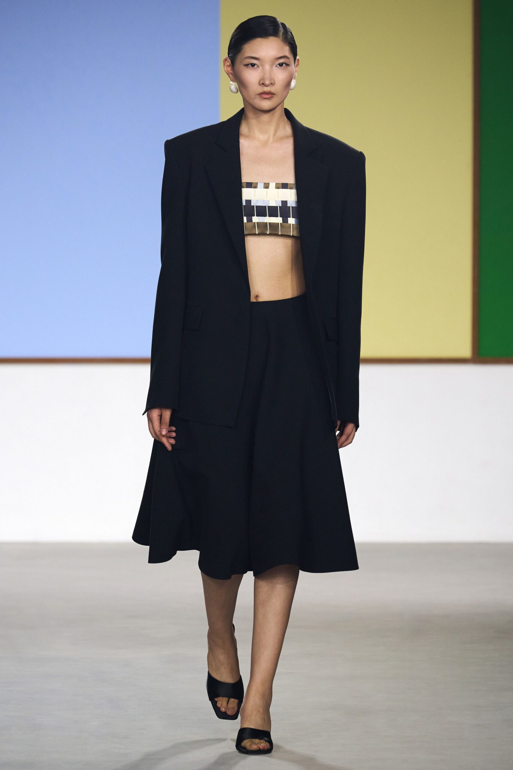 black oversized blazer with crop-top and skirt