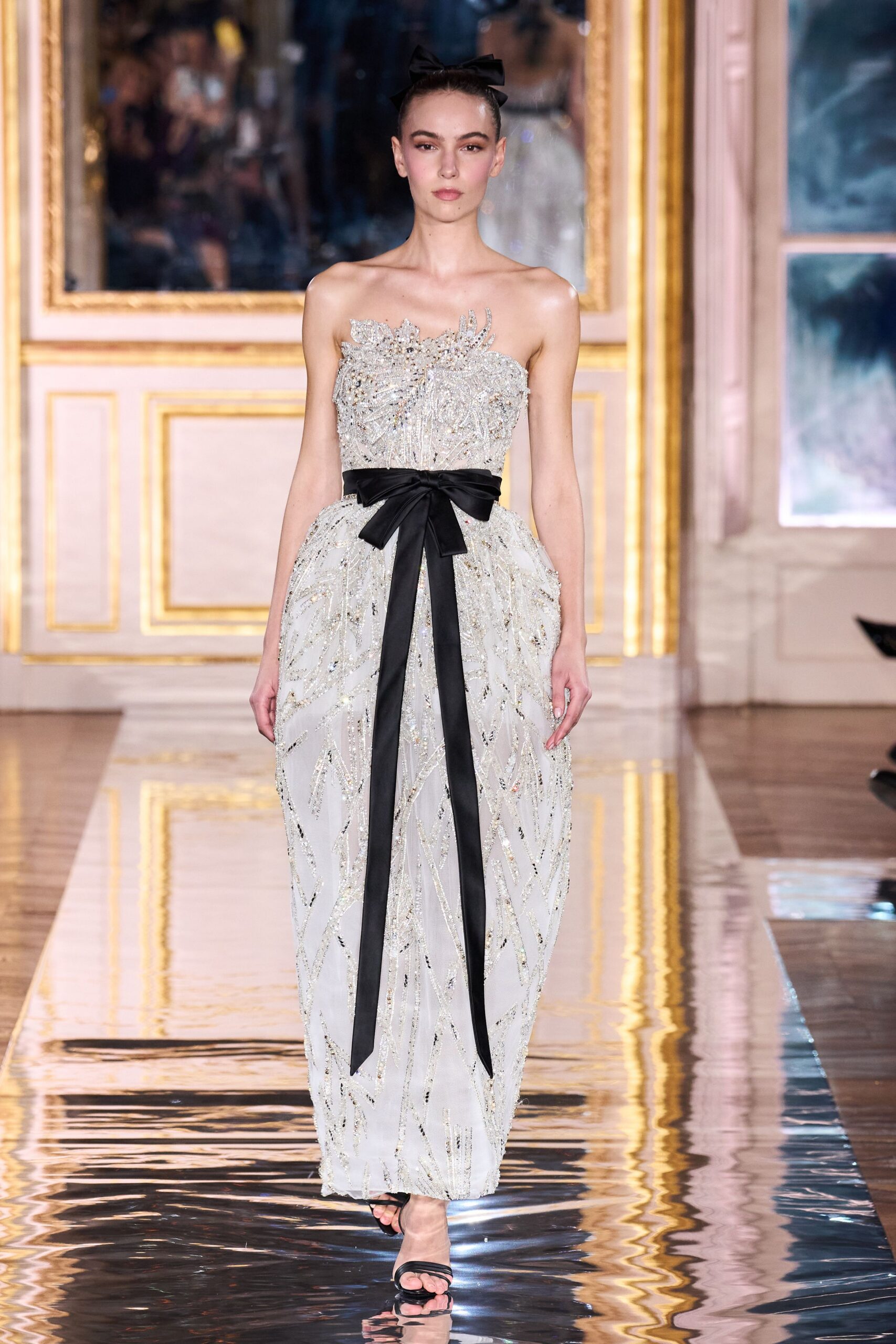 white silk strapless fitted beaded draped shiny gown