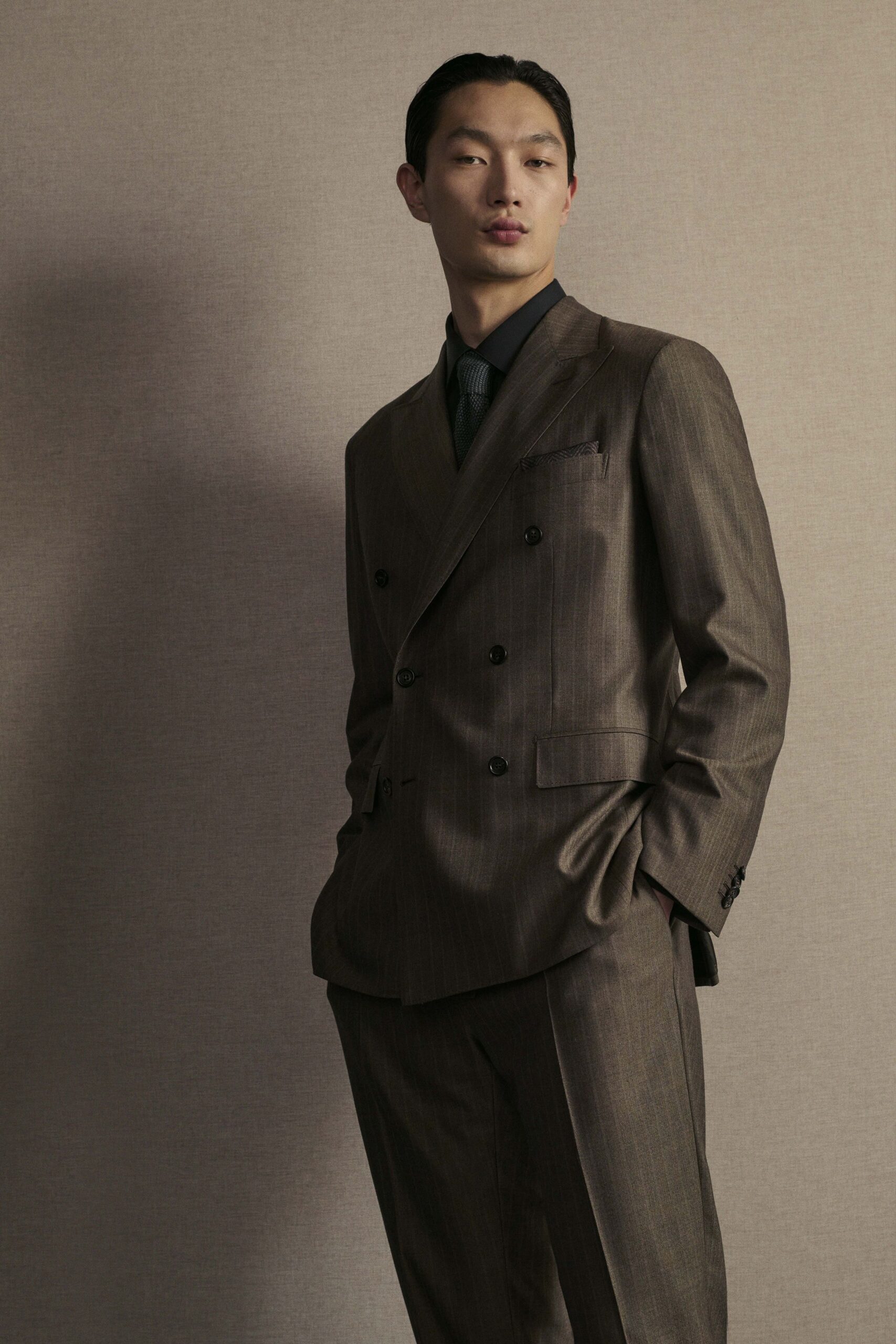 brown tailored striped suit