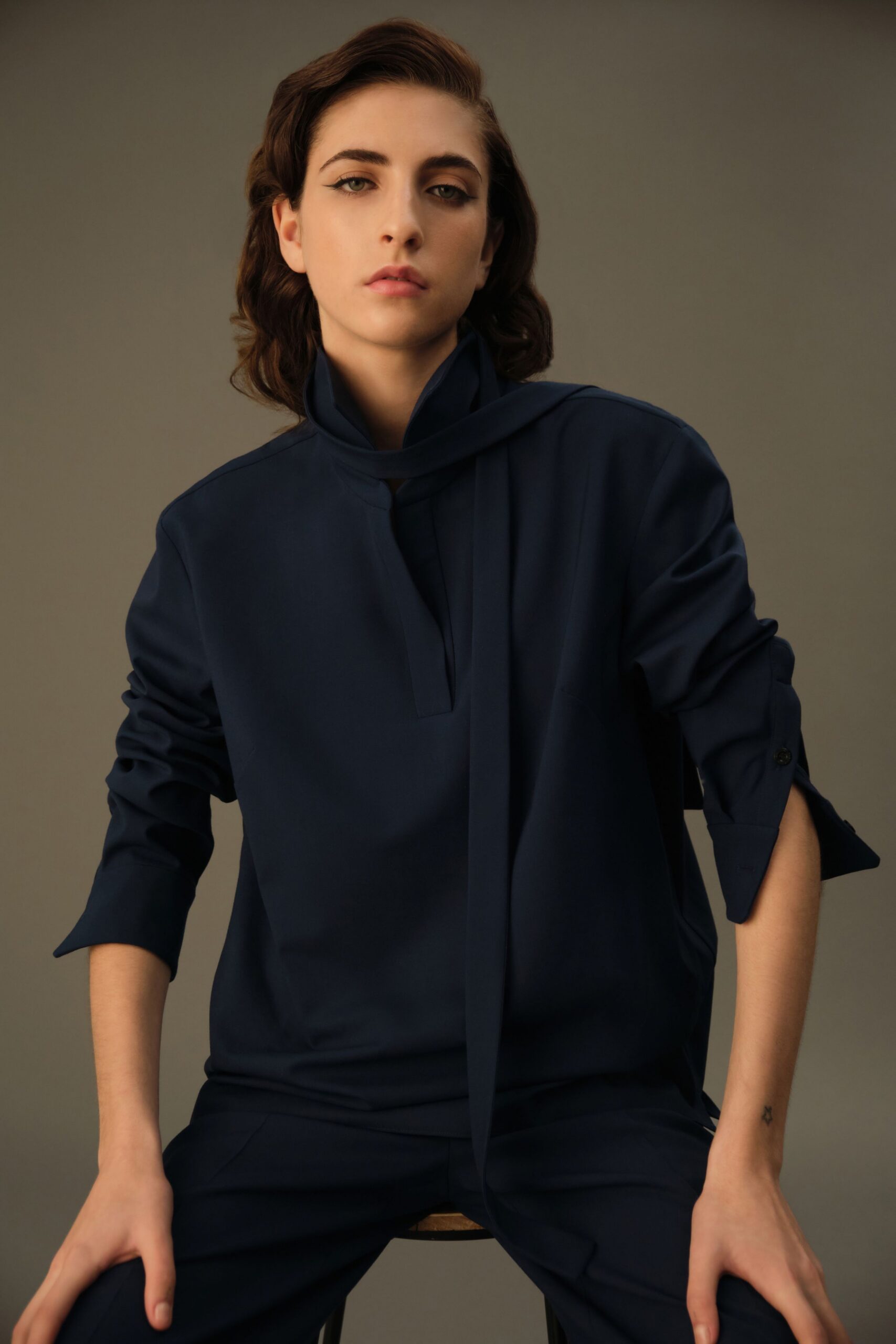 blue cotton long-sleeve collared relaxed zippered top