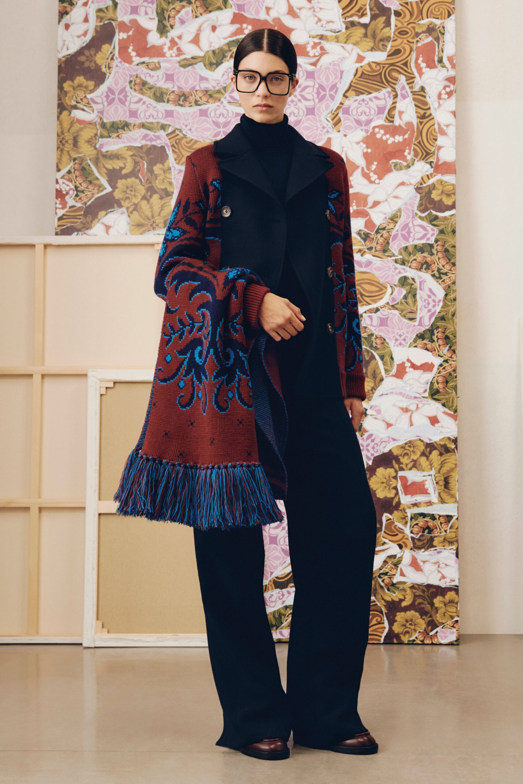 brown embroidered coat with black top