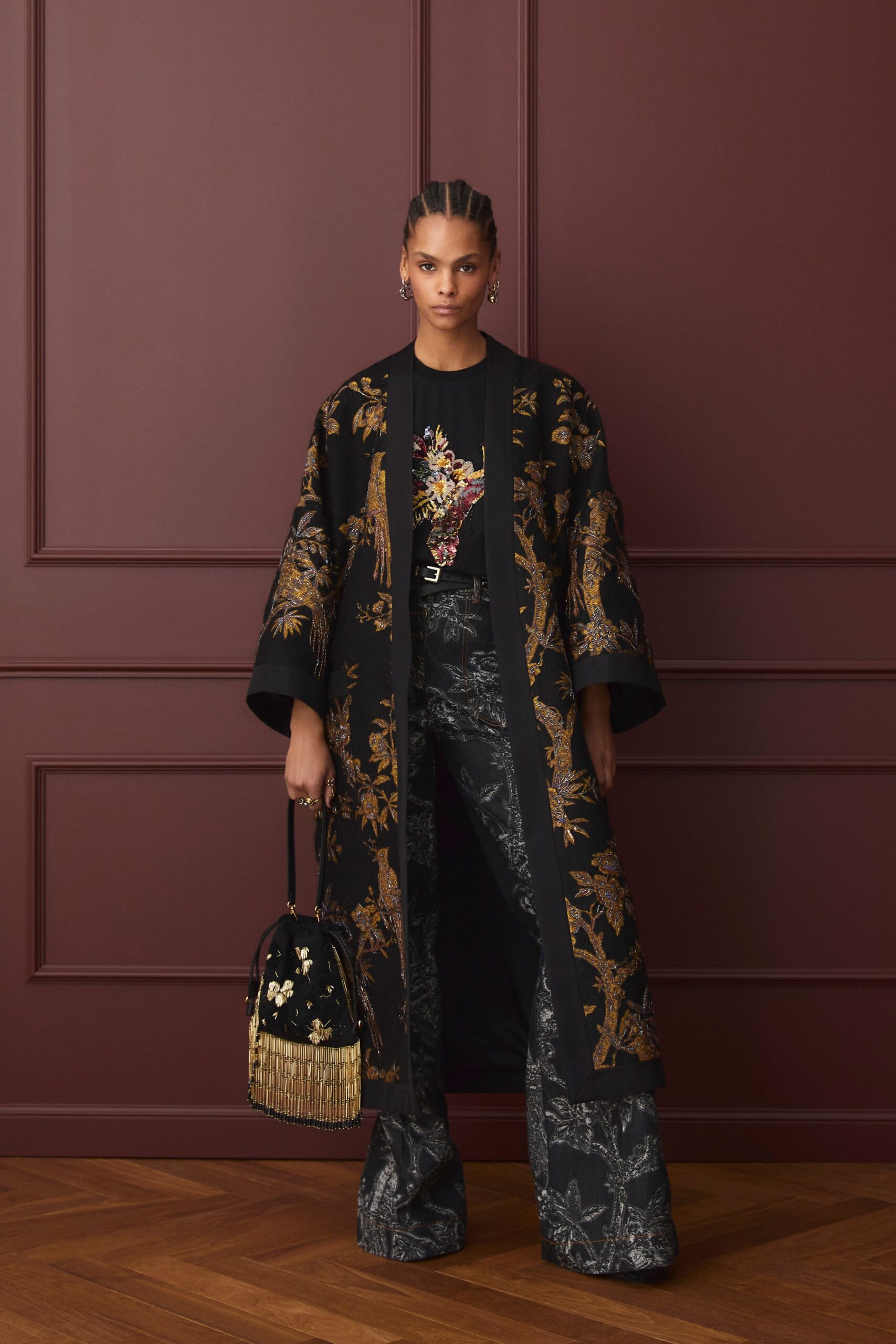 black embroidered coat with t-shirt and flared pants