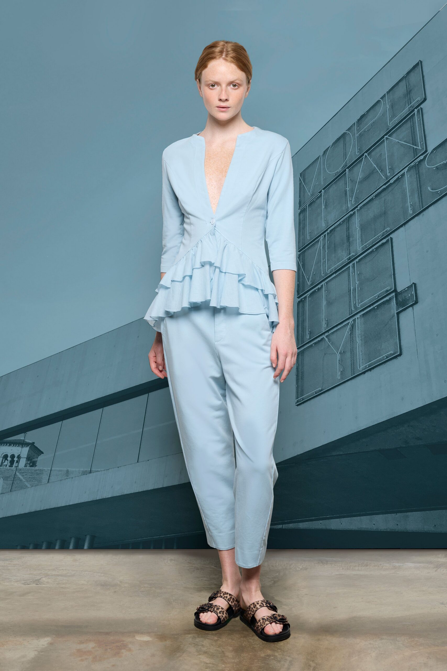 blue cotton long-sleeve v-neck fitted ruffled top