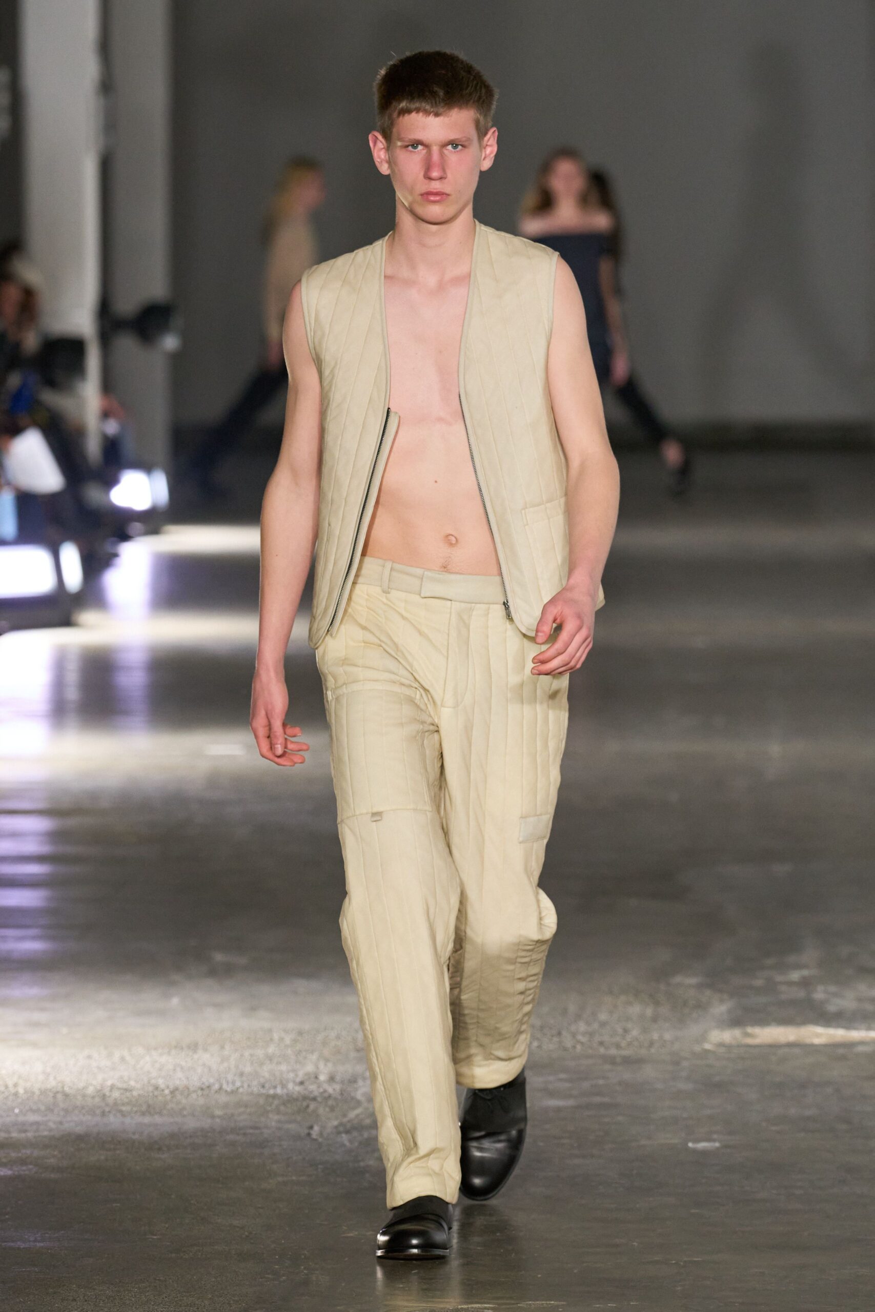 beige fitted vest and pants