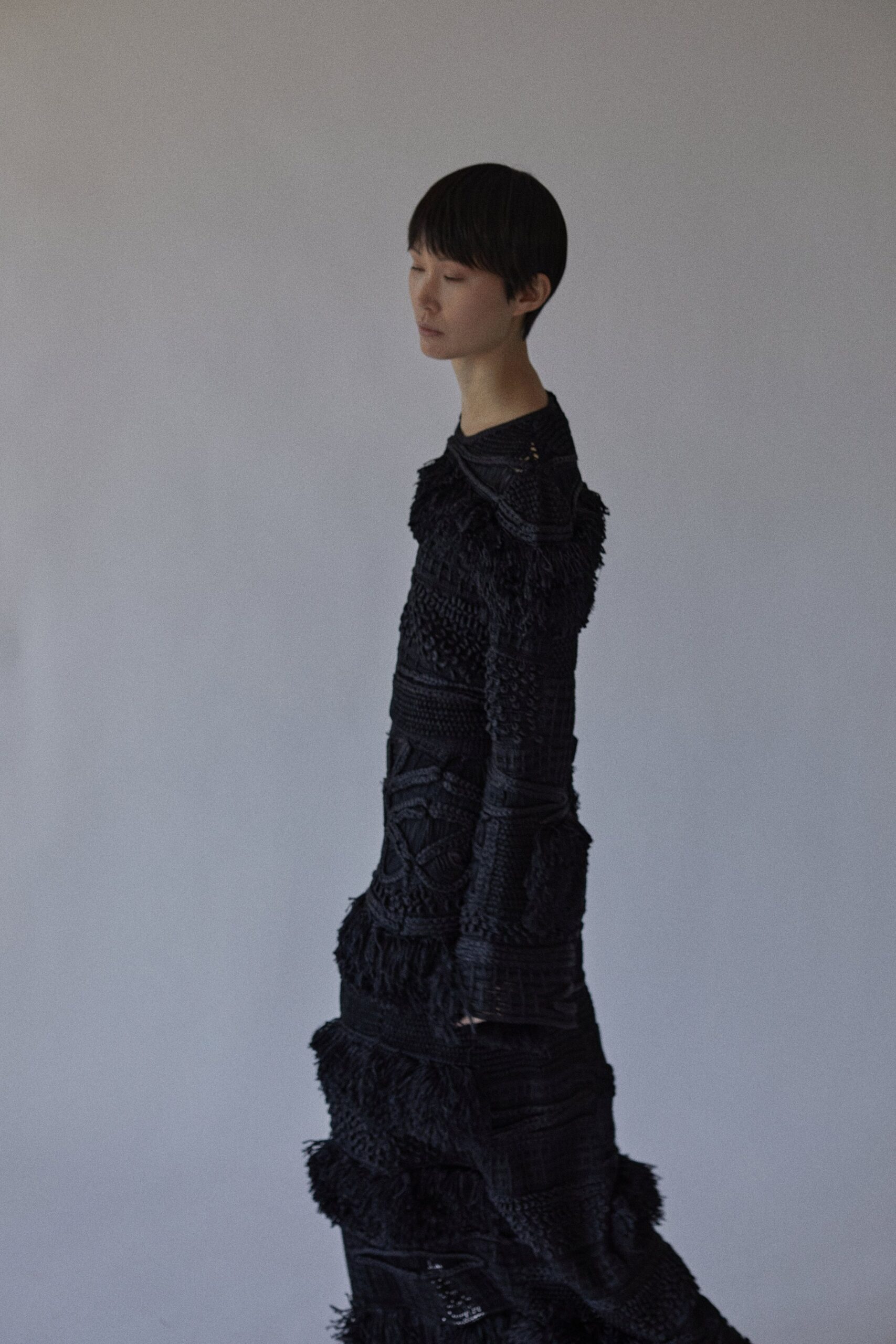 black fitted long-sleeve gown