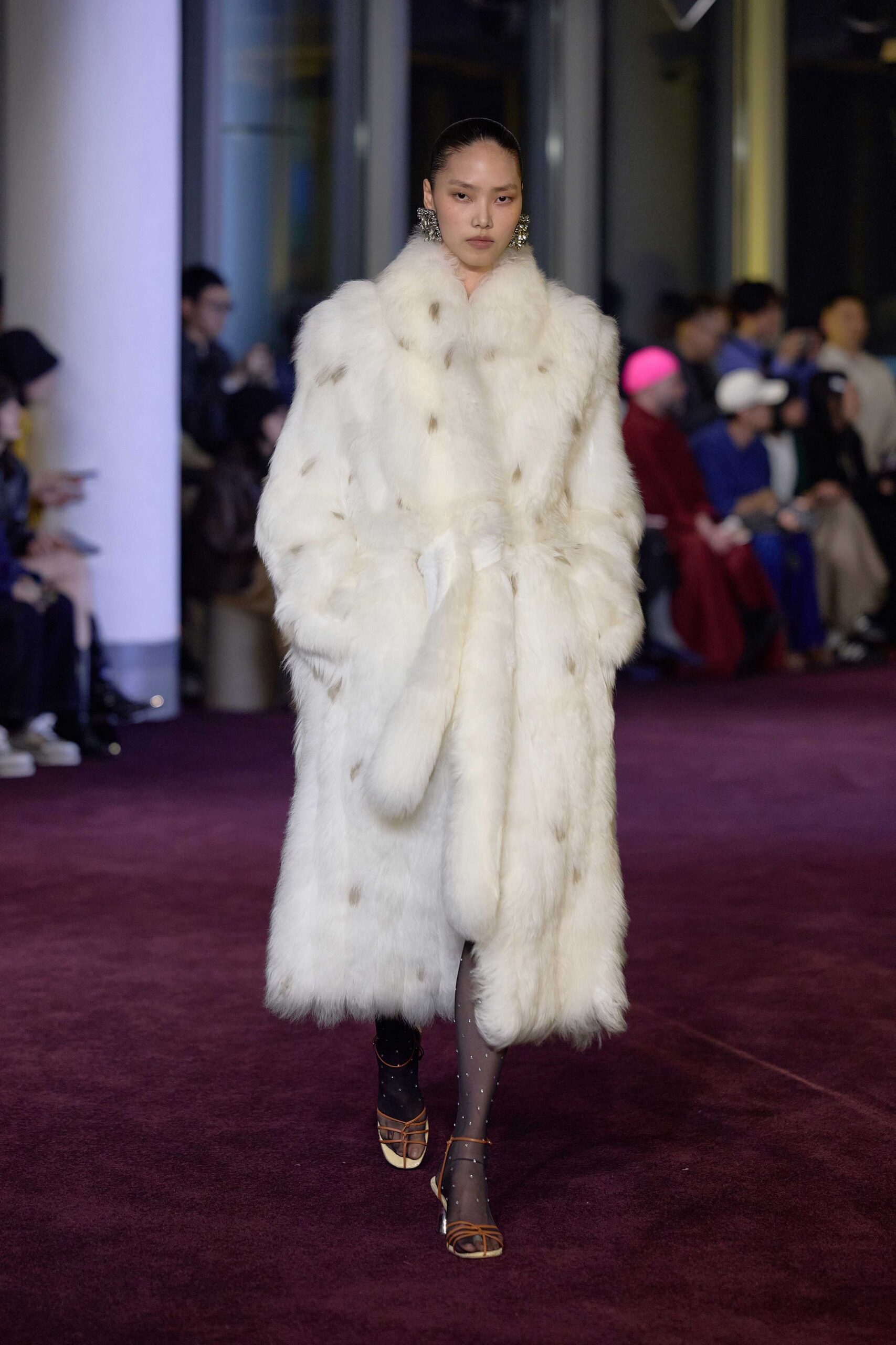 white faux-fur coat with gold shoes