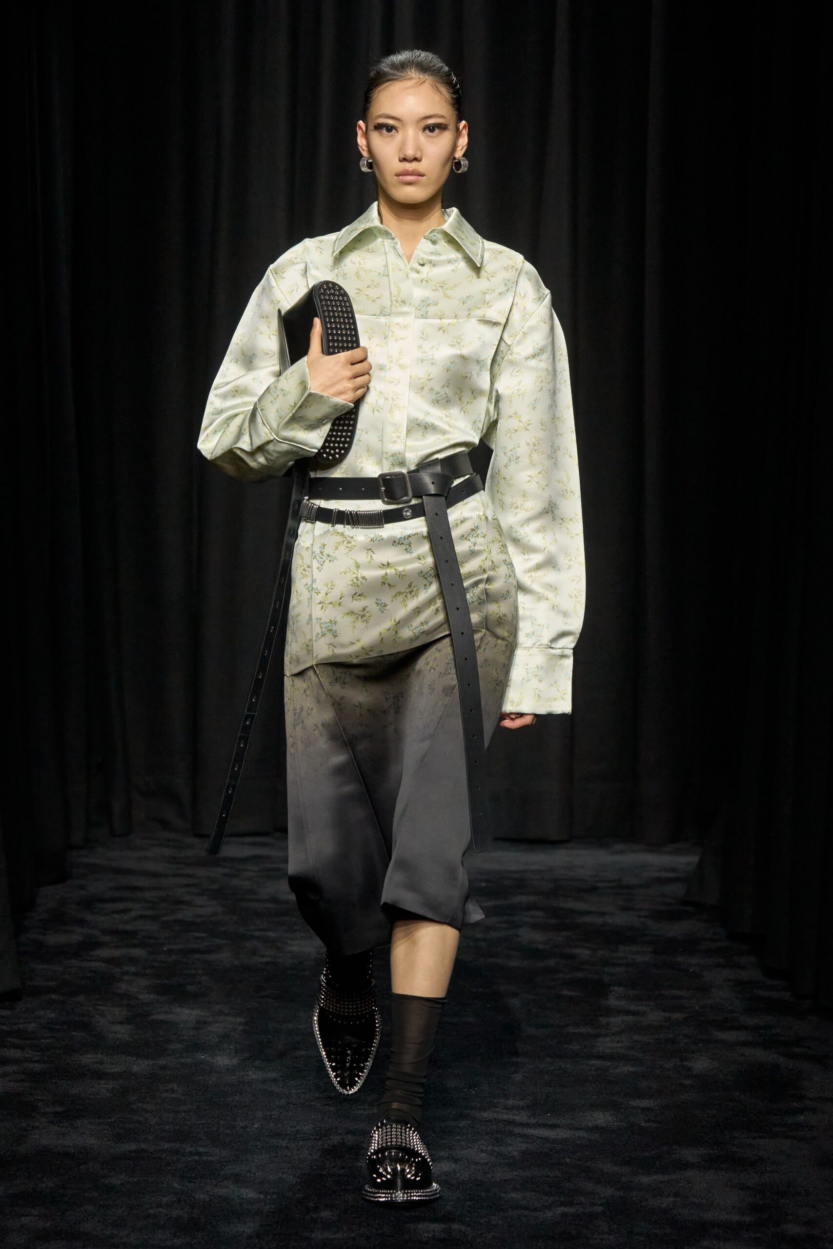 light green relaxed shirt with black pants