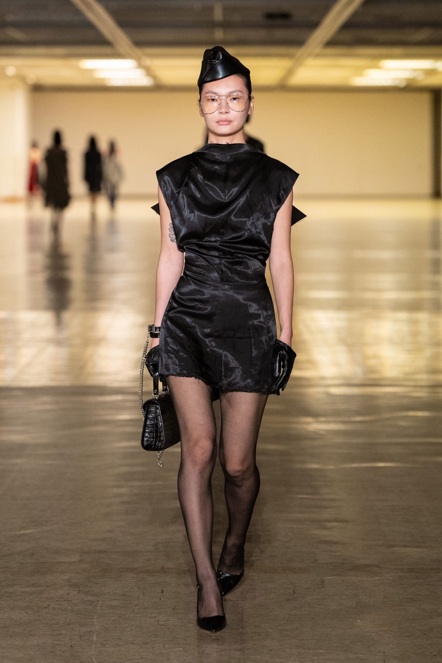 black silk sleeveless high-neck fitted structured romper