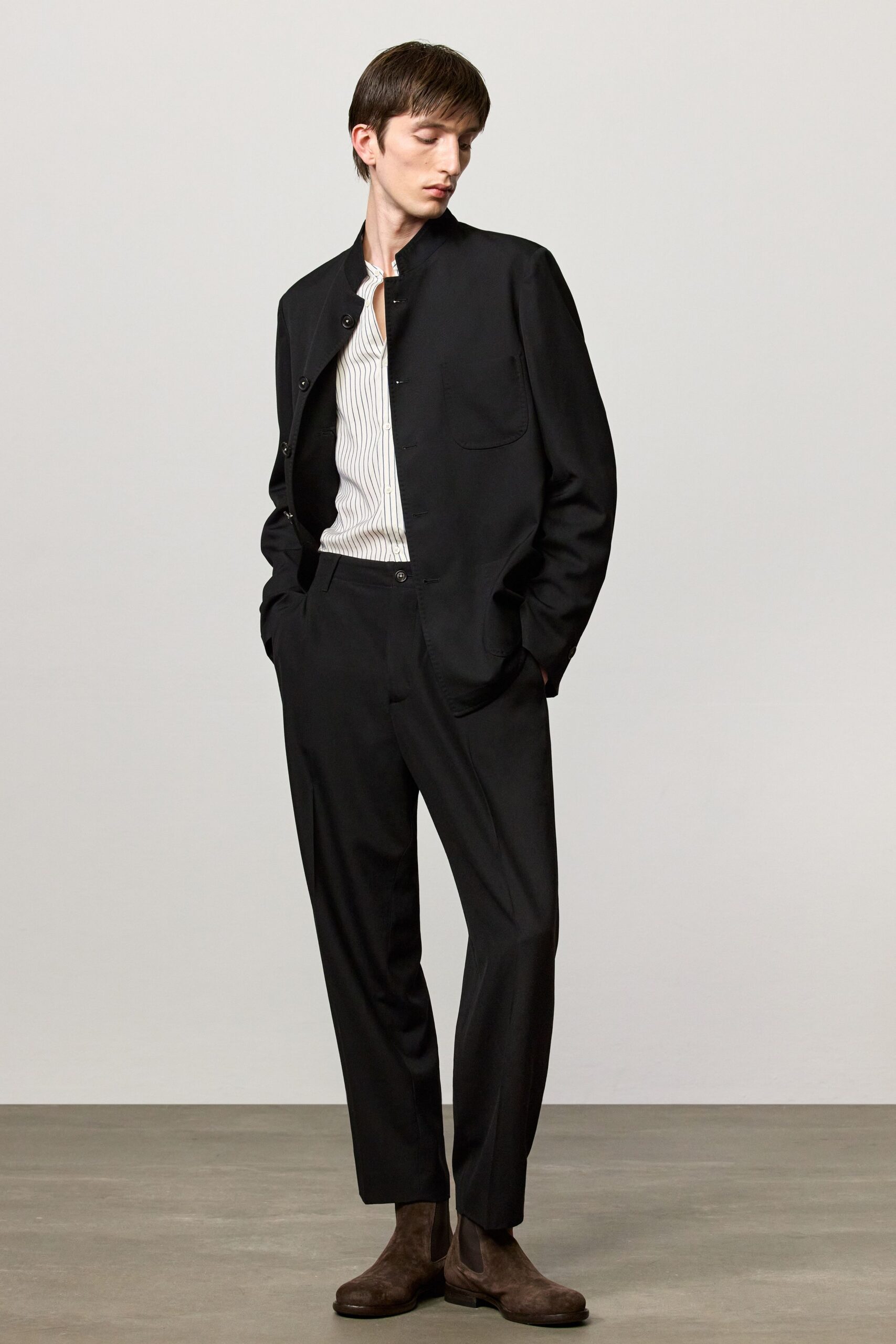 black jacket white striped shirt tailored pants
