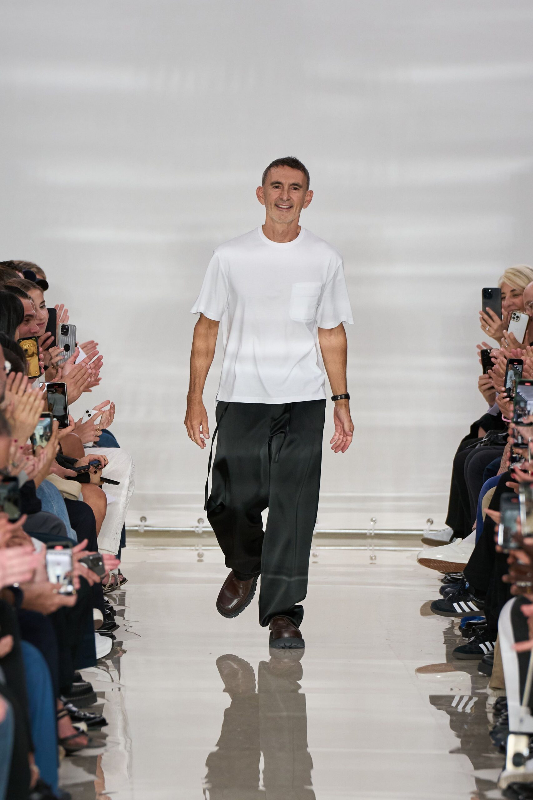 white t-shirt black pants brown shoes