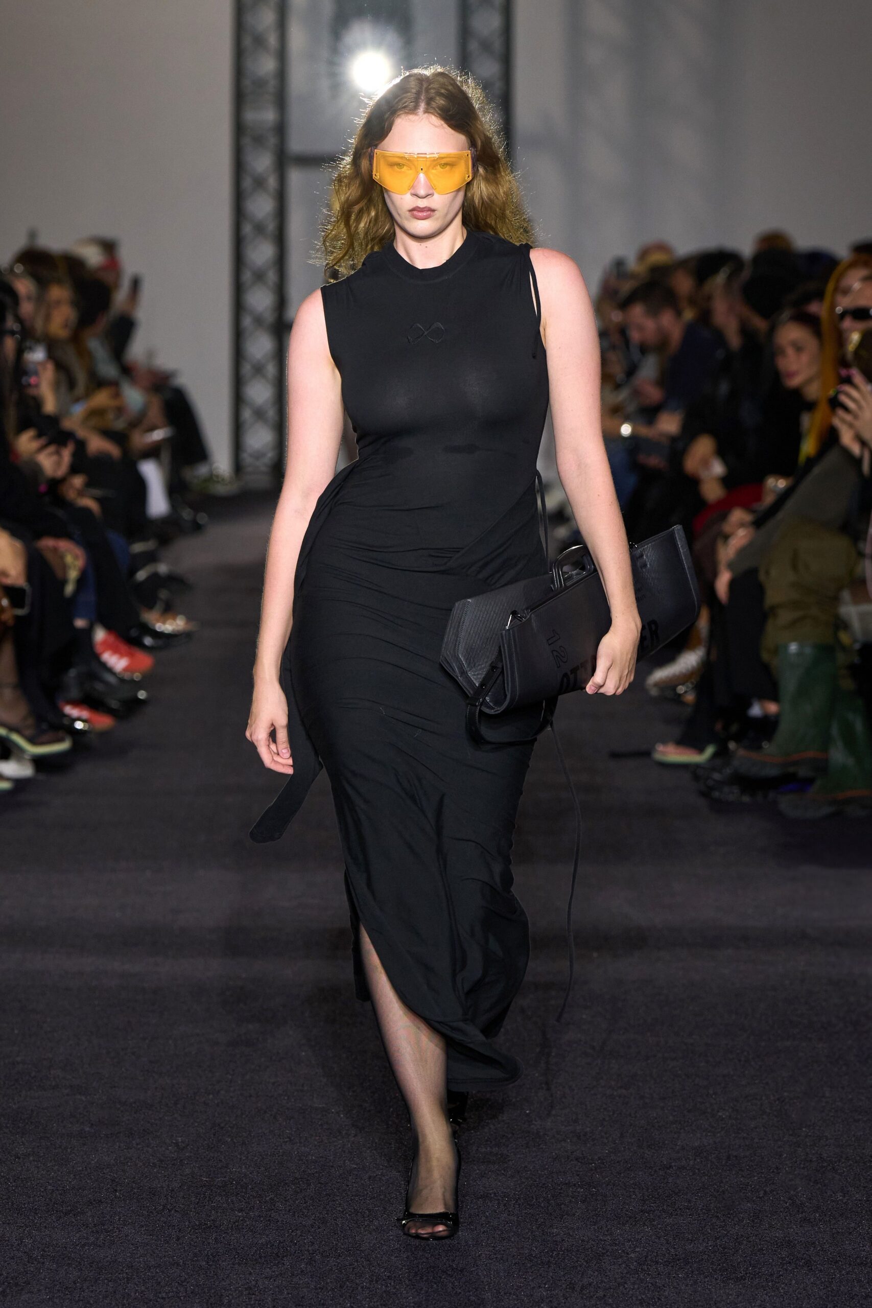 black fitted midi dress with accessories
