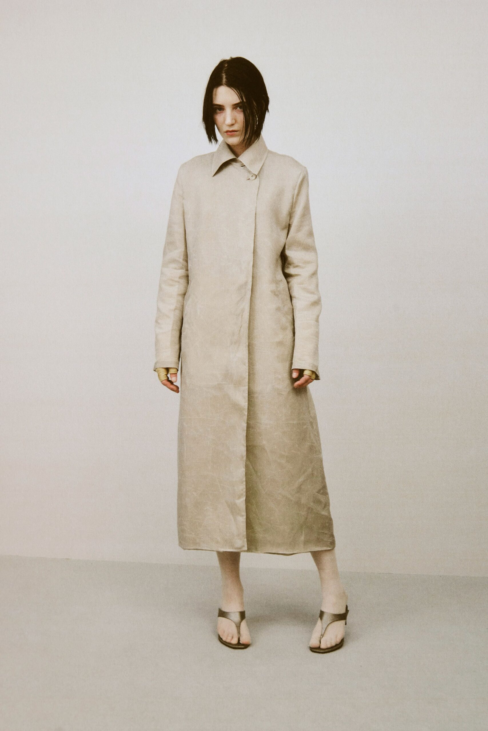 beige linen relaxed coat with black sandals