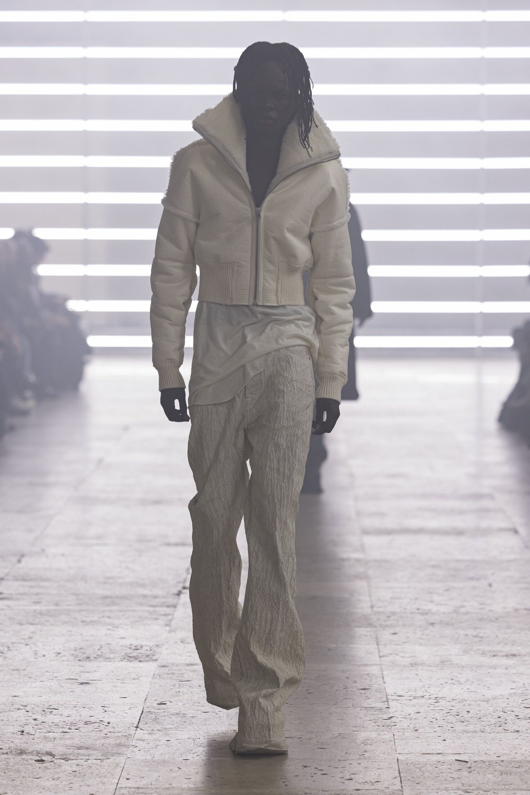white fitted jacket with relaxed top and pants
