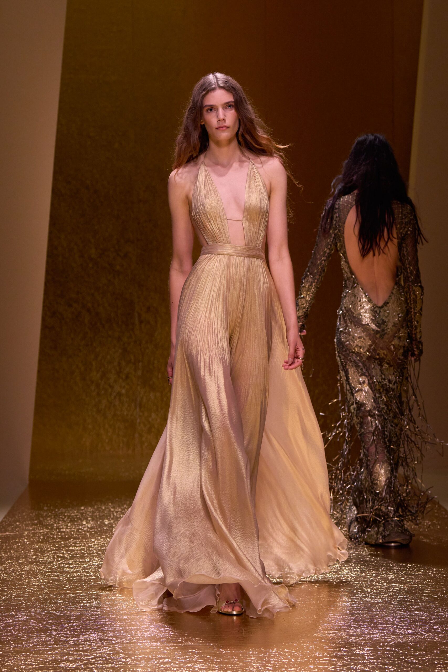 gold pleated sleeveless gown