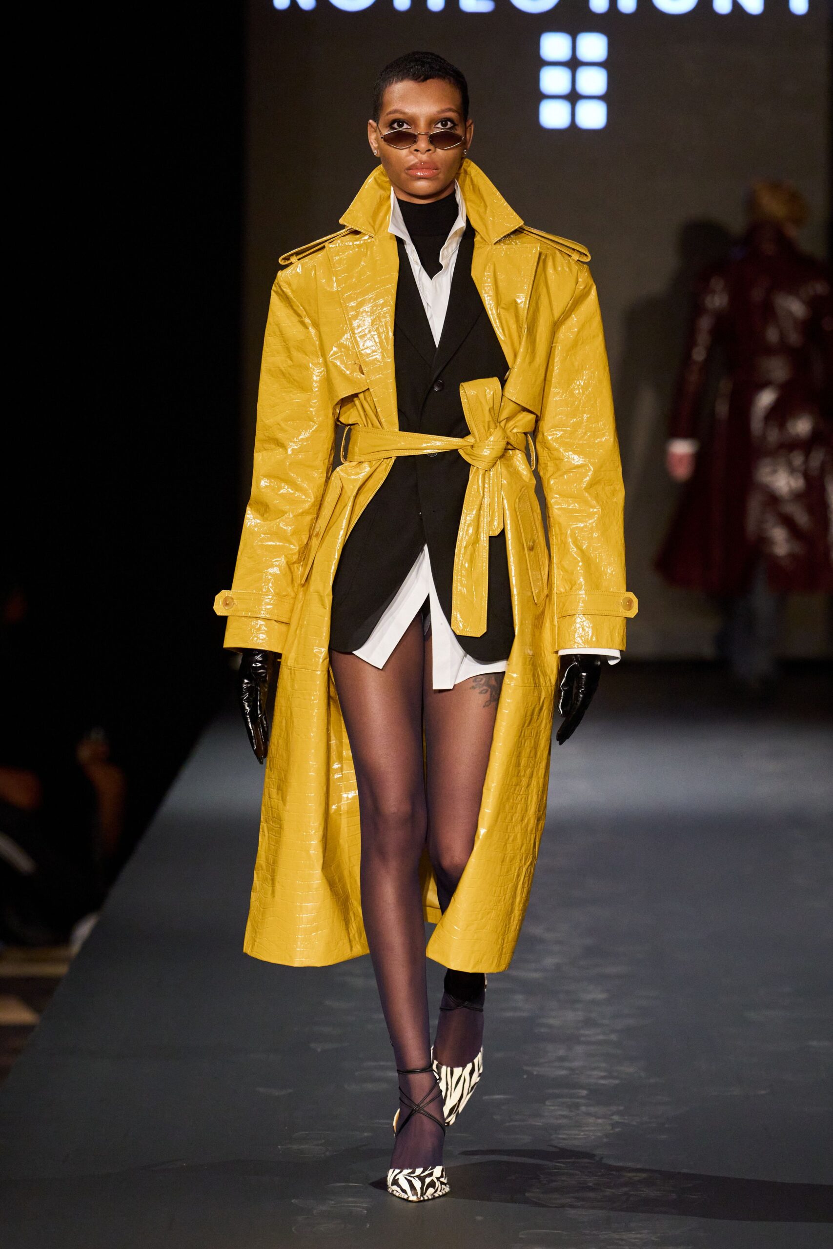 yellow vinyl long-sleeve collared fitted belted shiny trench