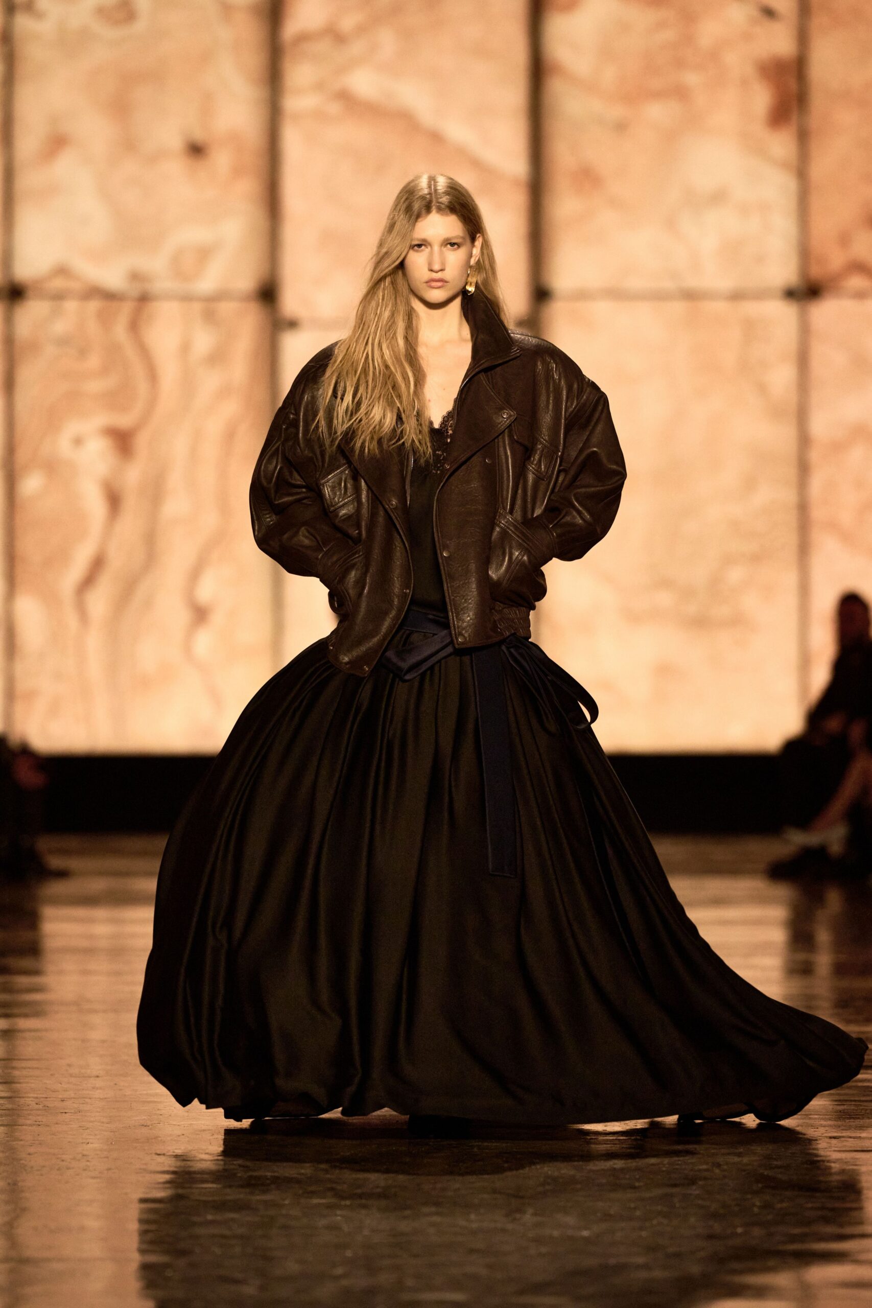 brown leather oversized jacket and black silk dress