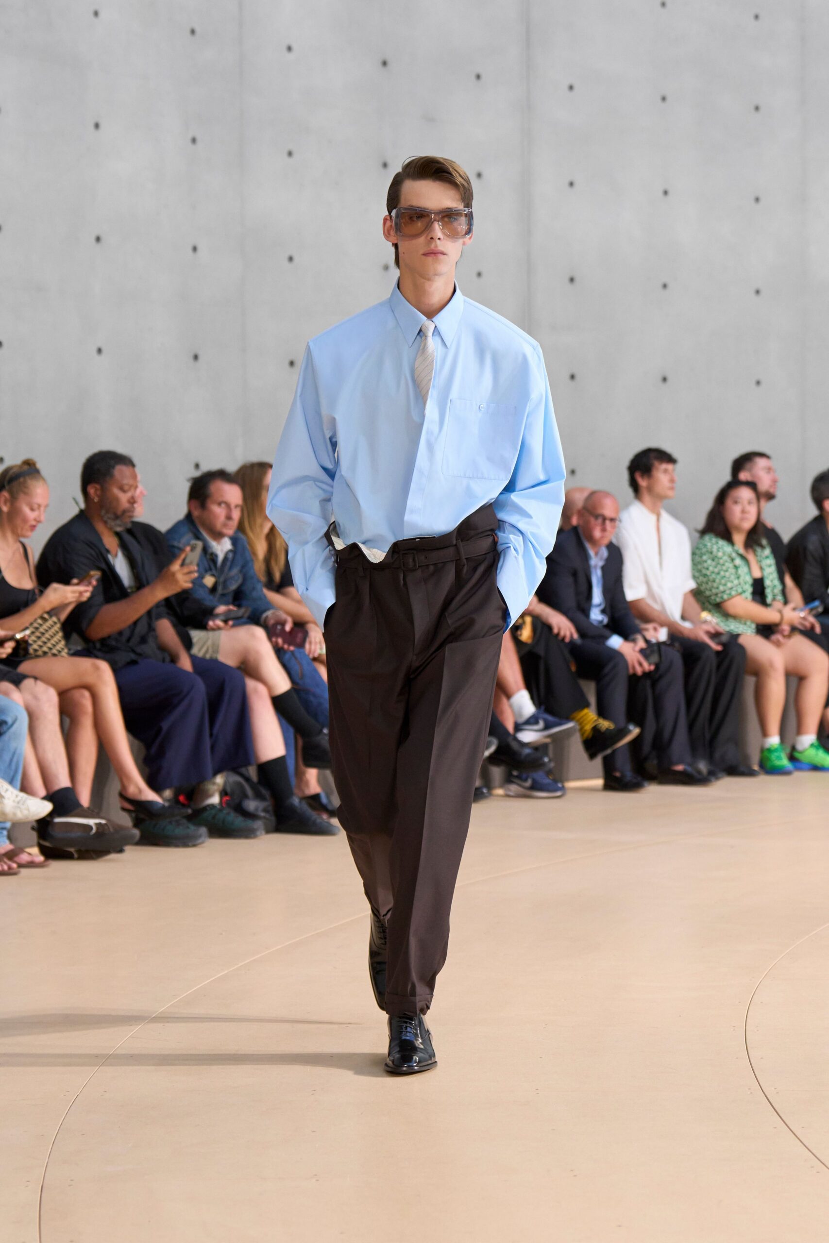 blue relaxed shirt with brown pants