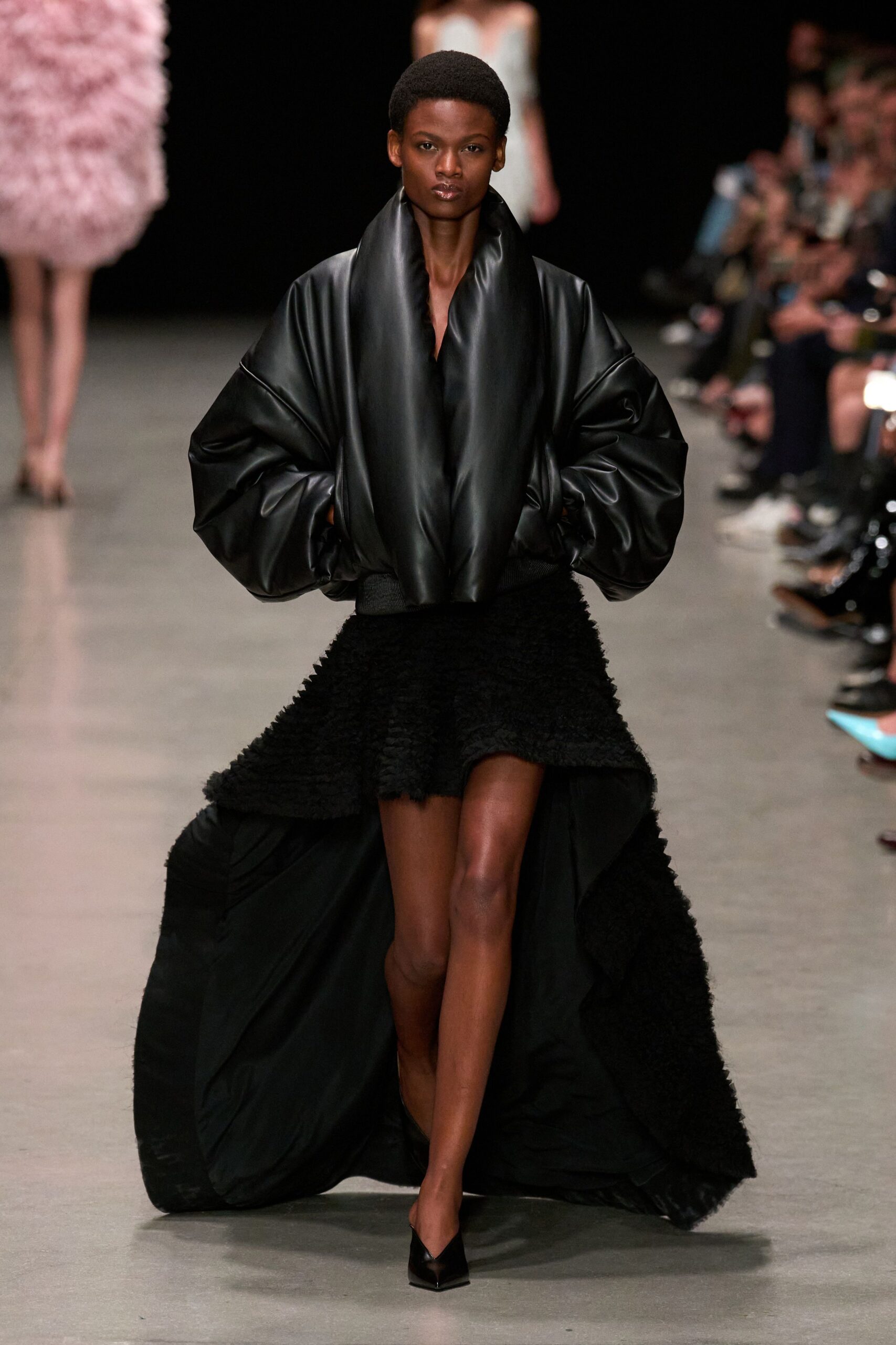 black oversized leather jacket and skirt