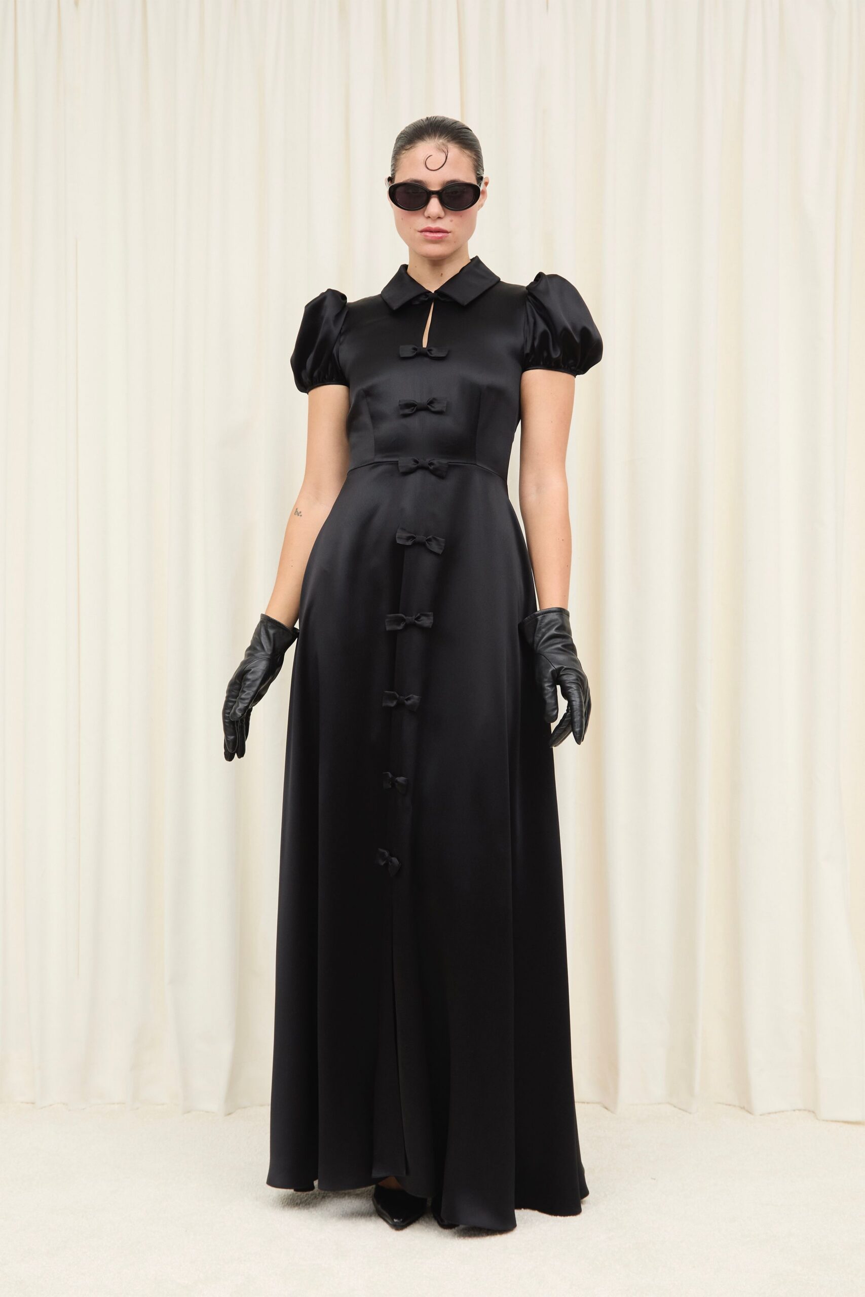 black silk short-sleeve collared fitted buttoned pleated gown