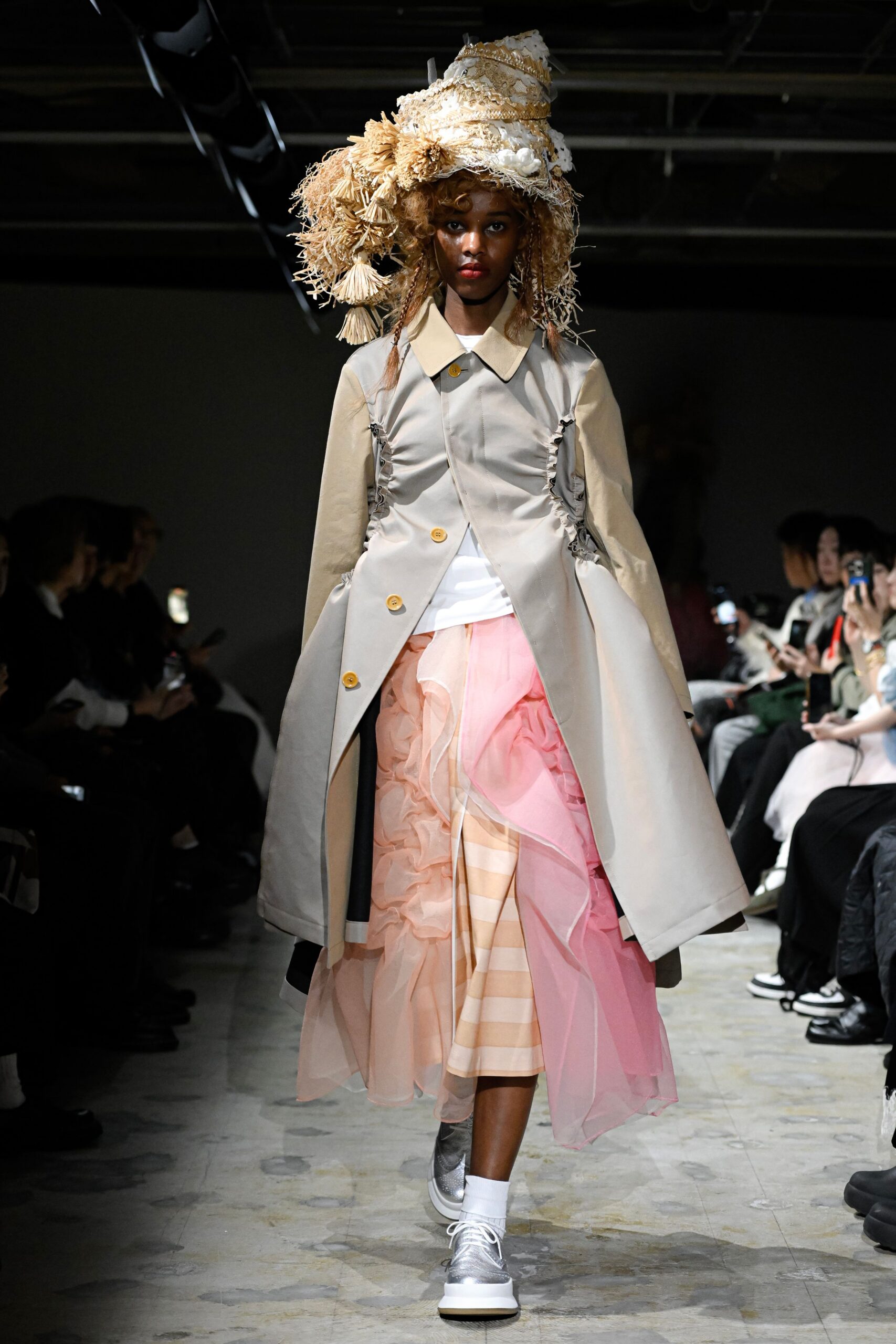 beige coat with pink skirt